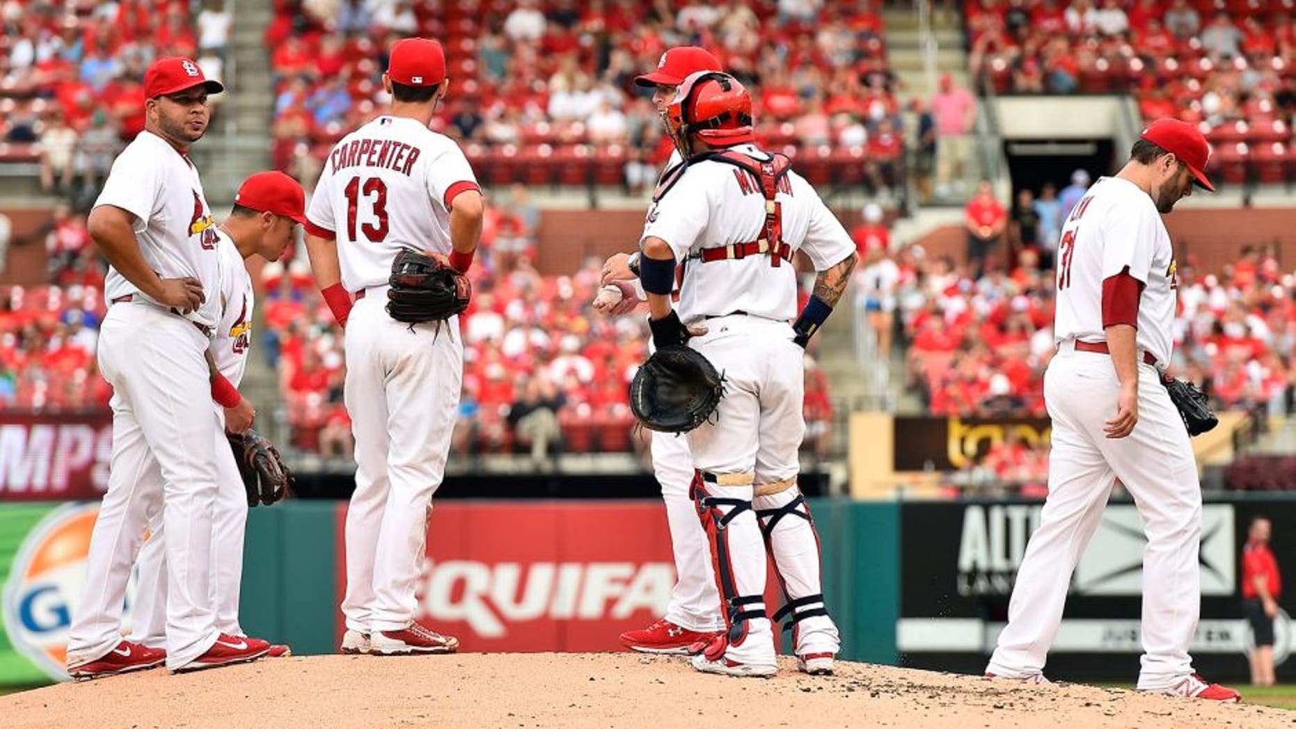 Aug 13, 2015; St. Louis, MO, USA; St. Louis Cardinals starting pitcher Lance Lynn (31) reacts after leaving the game against the Pittsburgh Pirates at Busch Stadium. Mandatory Credit: Jasen Vinlove-USA TODAY Sports