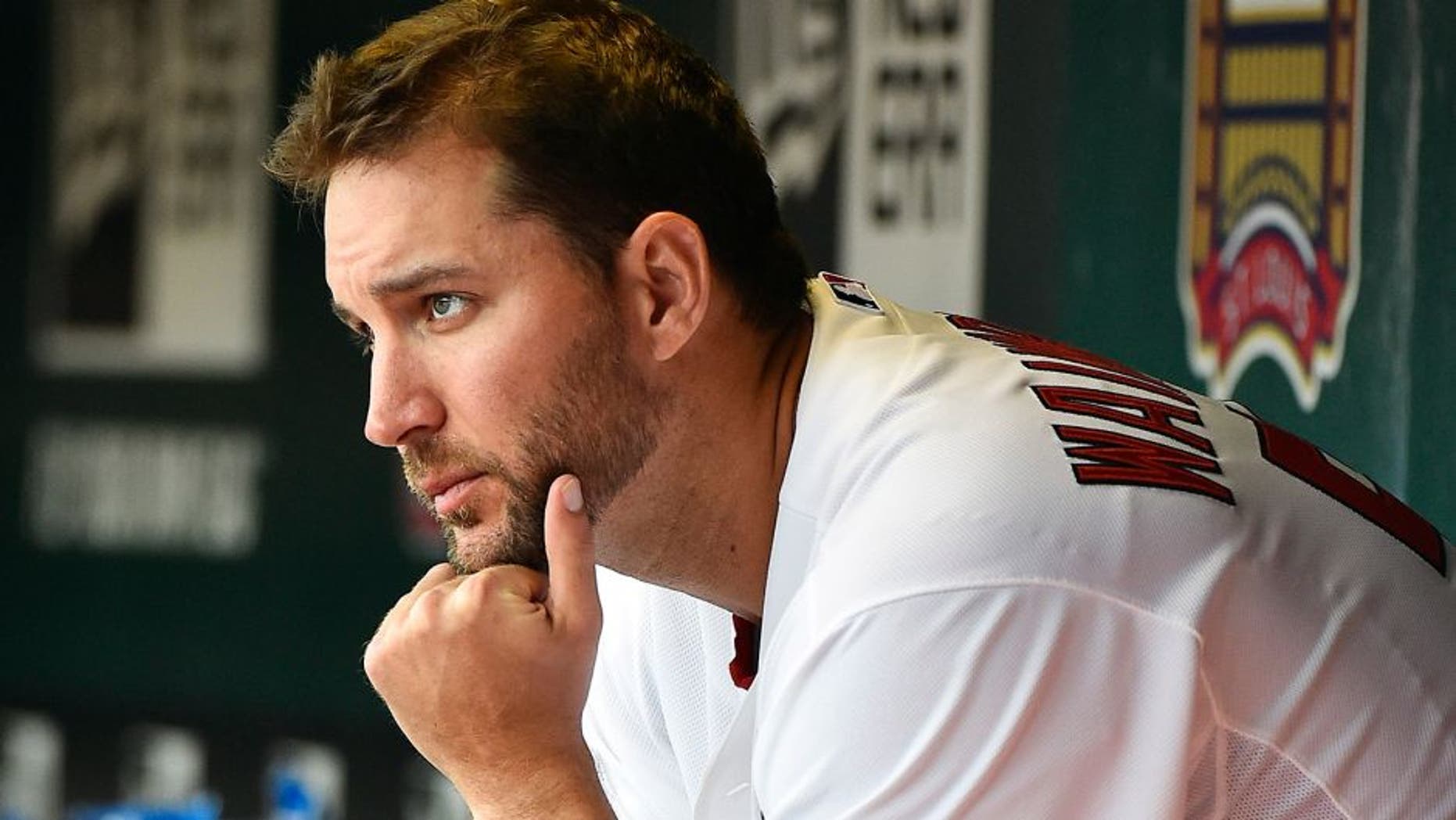 Apr 13, 2015; St. Louis, MO, USA; St. Louis Cardinals starting pitcher Adam Wainwright (50) sits in the dugout during the game against the Milwaukee Brewers at Busch Stadium. Mandatory Credit: Jasen Vinlove-USA TODAY Sports