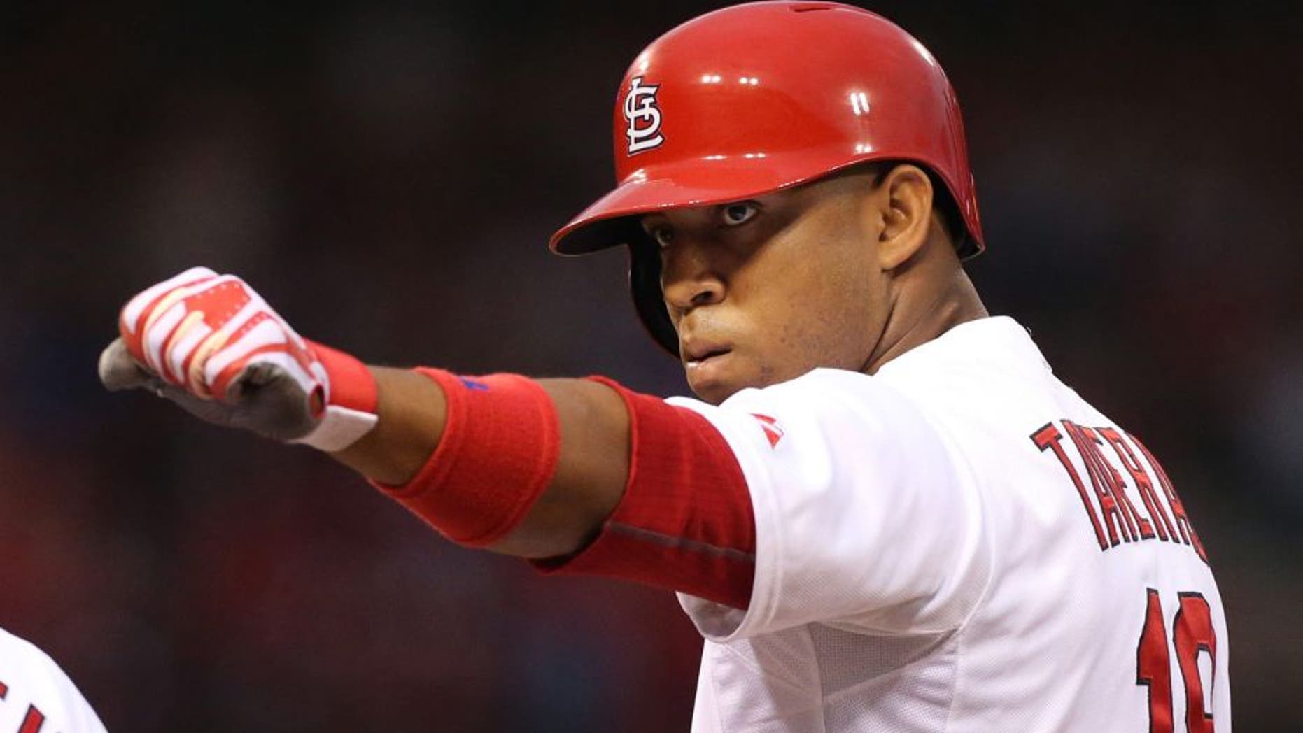 St. Louis Cardinals' Oscar Taveras gestures to teammates in the dugout after driving in a run with a single in first inning action during a baseball game between the St. Louis Cardinals and the Boston Red Sox on Thursday, Aug. 7, 2014, at Busch Stadium in St. Louis. (AP Photo/St. Louis Post-Dispatch, Chris Lee) EDWARDSVILLE INTELLIGENCER OUT; THE ALTON TELEGRAPH OUT