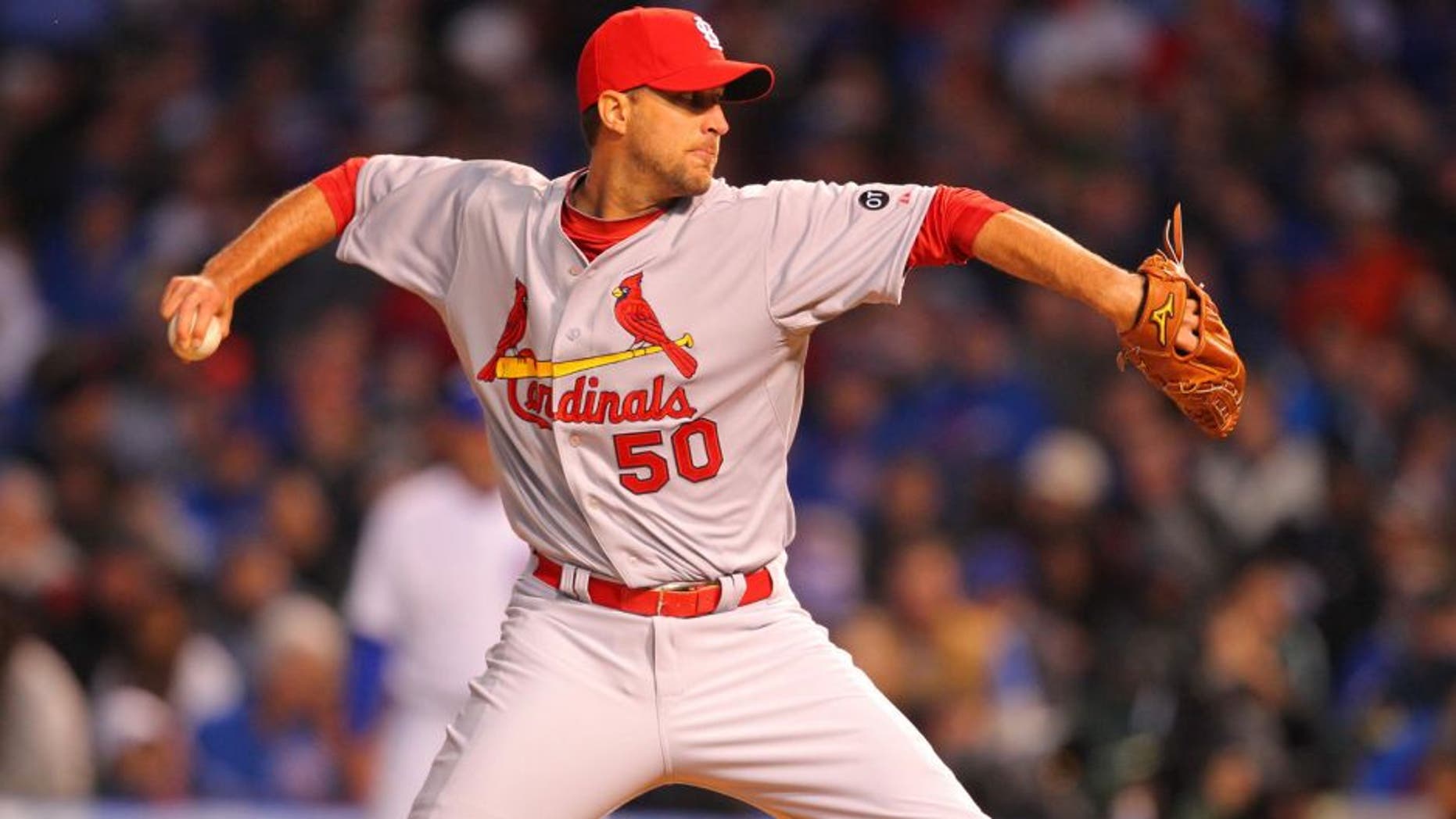 Apr 5, 2015; Chicago, IL, USA; St. Louis Cardinals starting pitcher Adam Wainwright (50) delivers a pitch during the first inning against the Chicago Cubs at Wrigley Field. Mandatory Credit: Dennis Wierzbicki-USA TODAY Sports