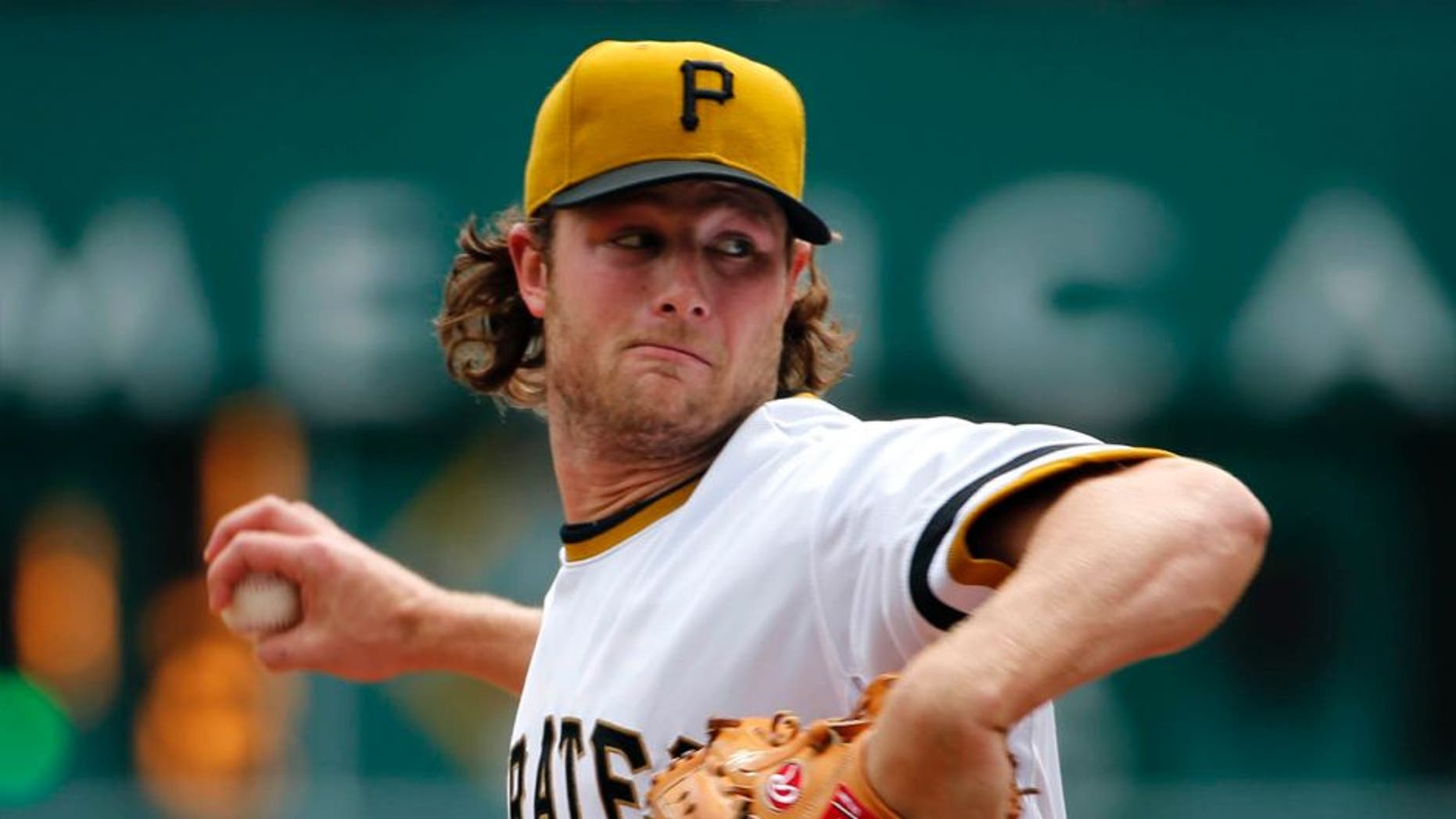 Pittsburgh Pirates starting pitcher Gerrit Cole throws in the first inning against the Milwaukee Brewers in Pittsburgh, Sunday, April 19, 2015.