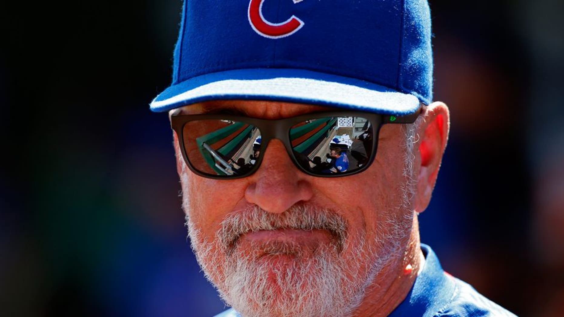 Chicago Cubs manager Joe Maddon stands in the dugout during the first baseball game of a doubleheader in Pittsburgh against the Pittsburgh Pirates, Tuesday, Sept. 15, 2015. (AP Photo/Gene J. Puskar)