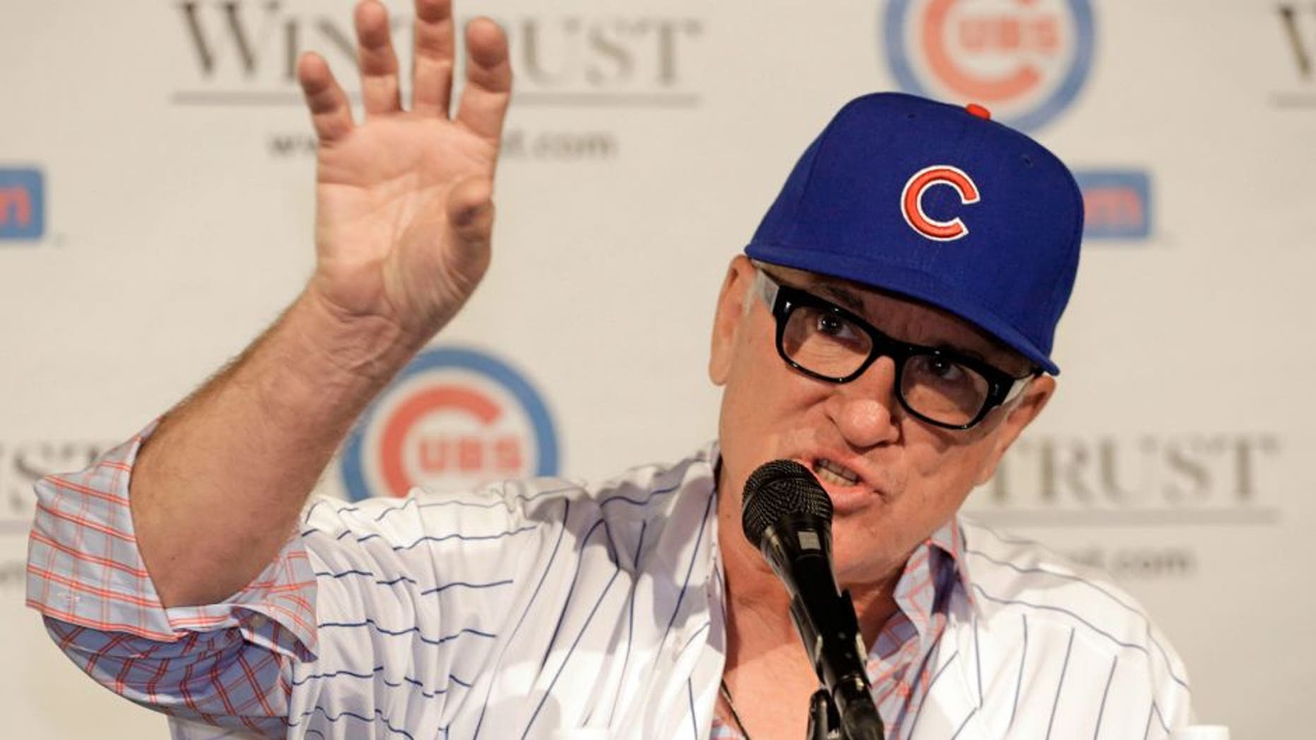 Joe Maddon is introduced as the new manager of the Chicago Cubs baseball team Monday, Nov. 3, 2014, in Chicago. (AP Photo/M. Spencer Green)