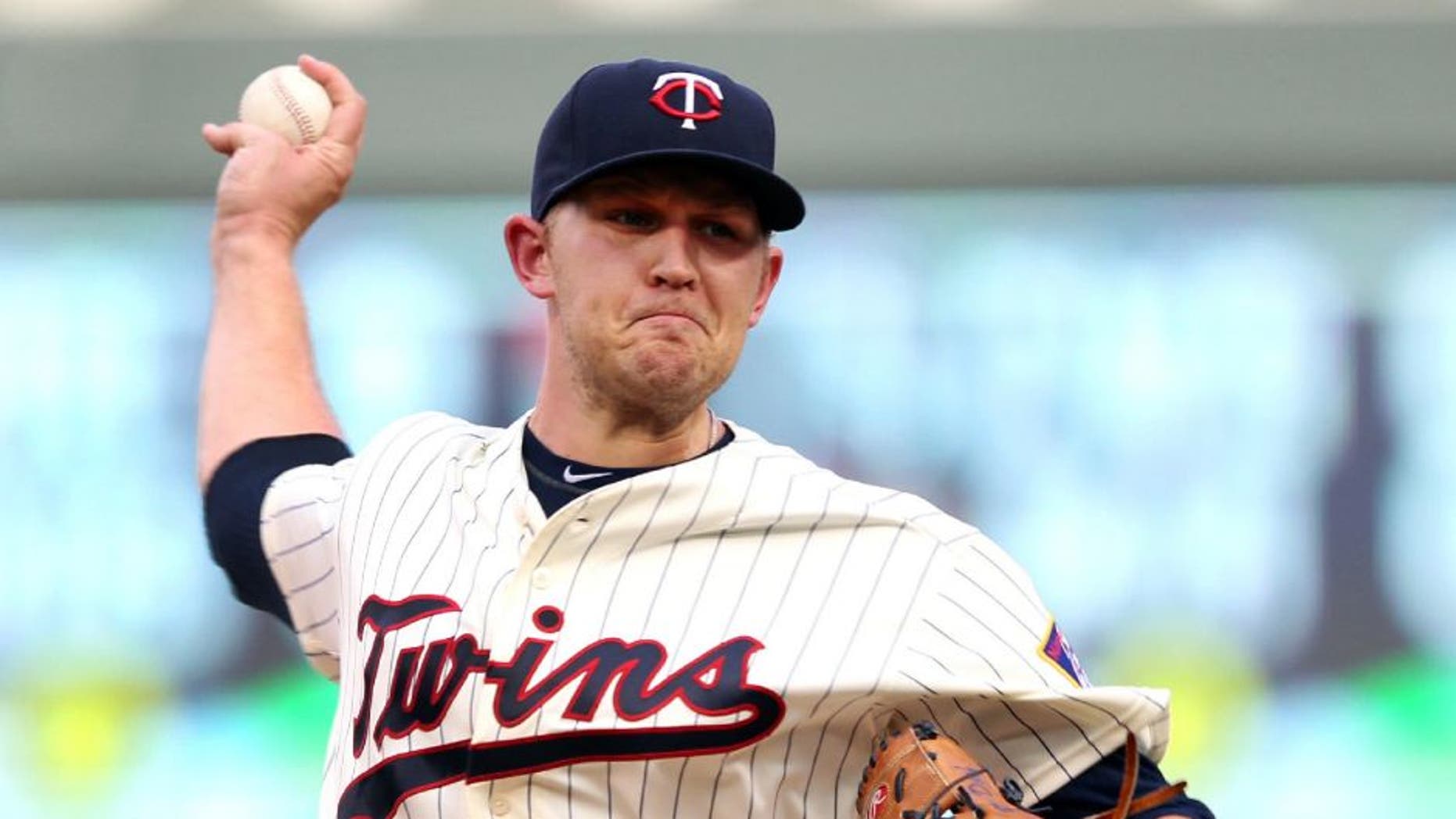 Minnesota Twins starting pitcher Tyler Duffey throws to the Kansas City Royals in the first inning on Saturday, Aug., 13, 2016, in Minneapolis.