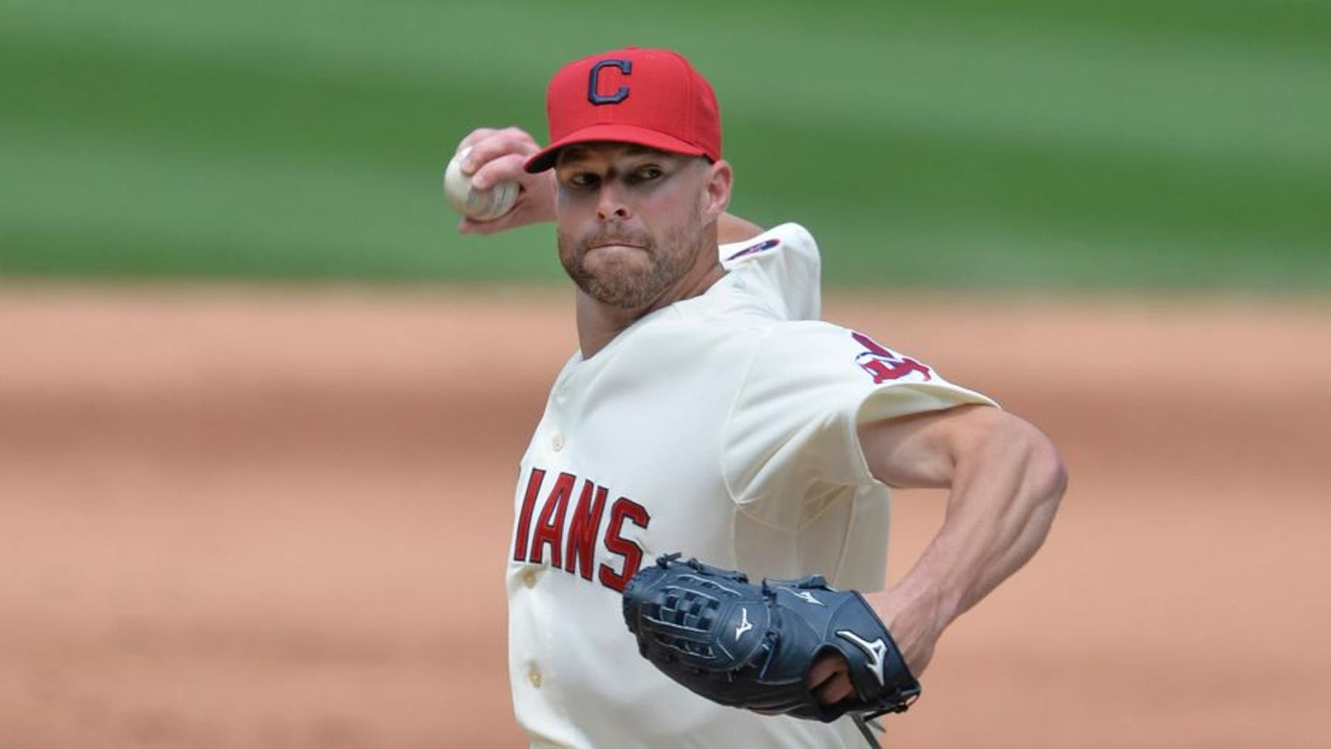 Cleveland Indians starting pitcher Corey Kluber delivers in the sixth inning against the Minnesota Twins at Progressive Field on Sunday, August 9, 2015.