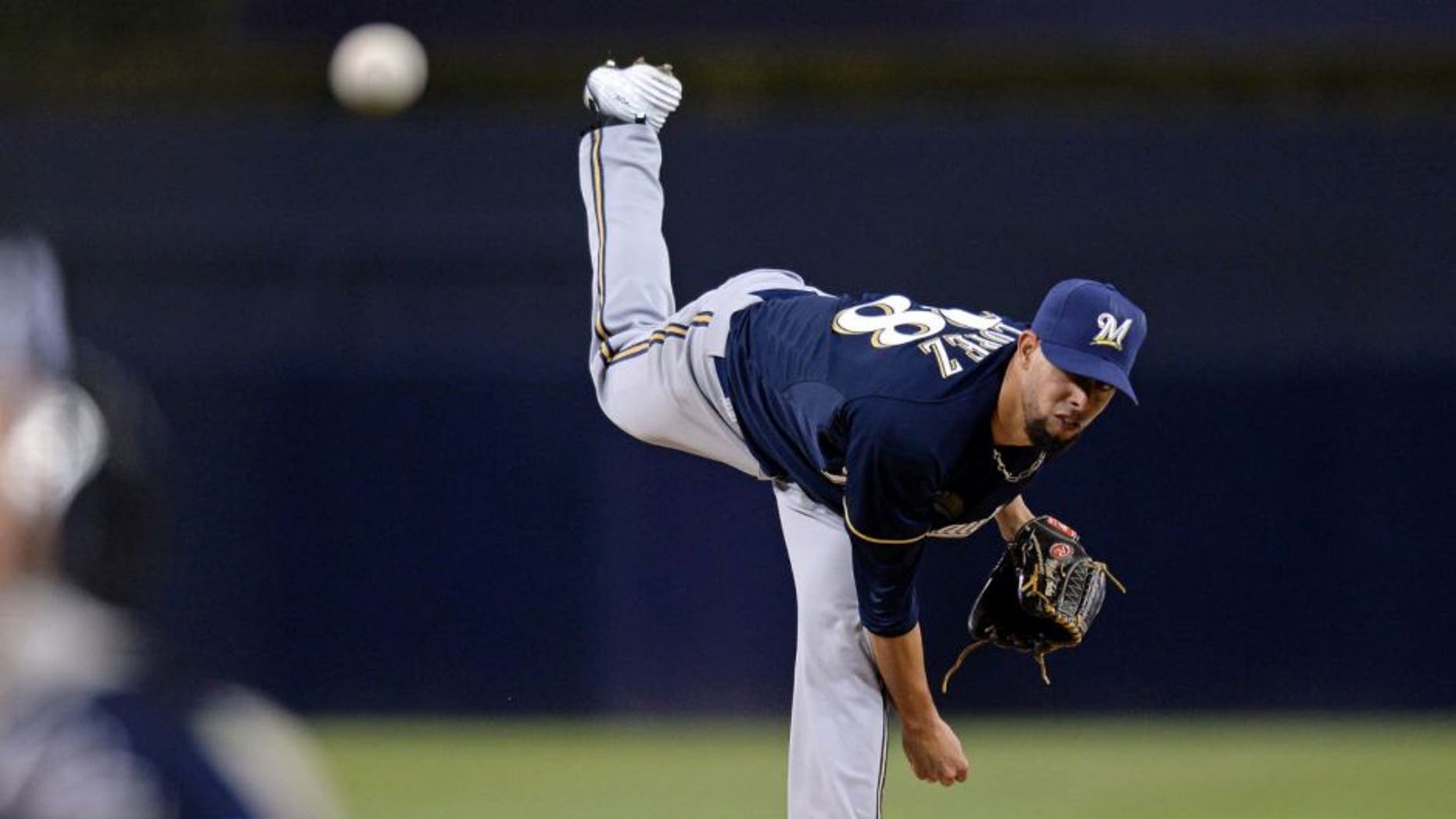 Milwaukee Brewers starting pitcher Jorge Lopez pitches during the first inning of his major league debut against the San Diego Padres at Petco Park on Tuesday, Sept. 29, 2015.