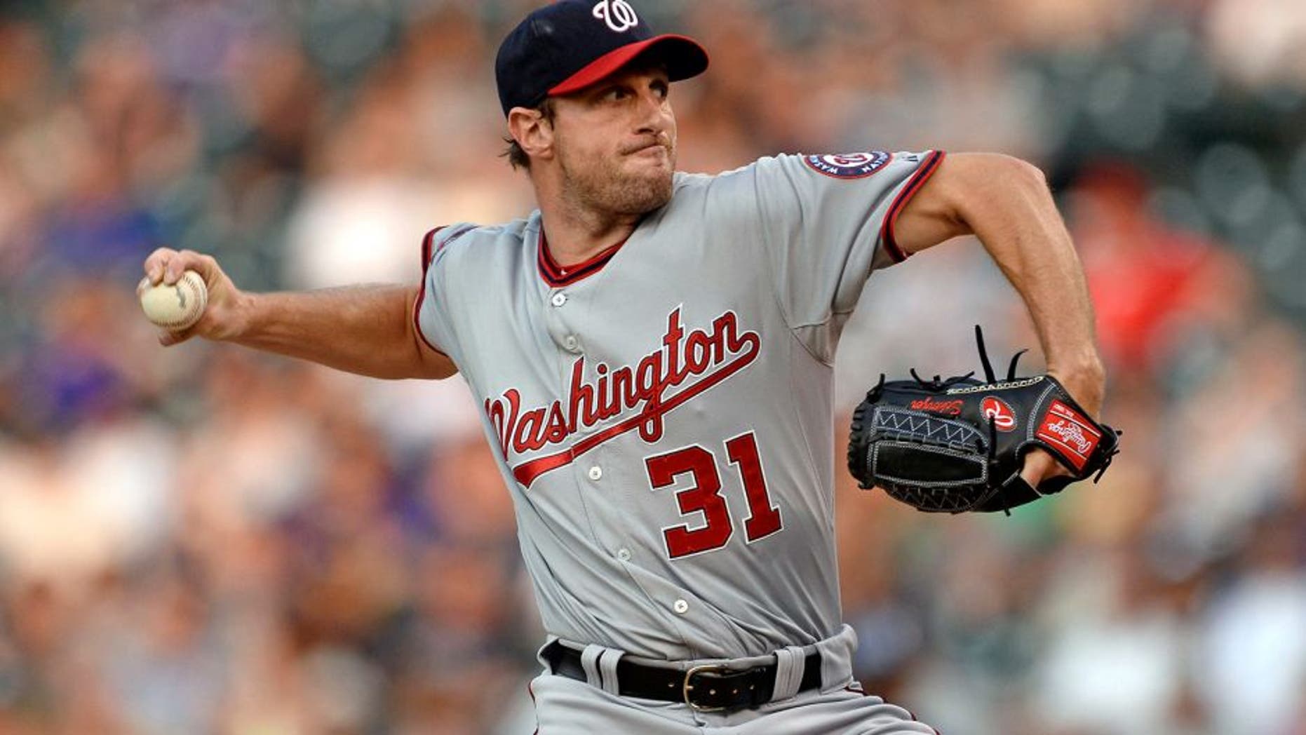 Aug 20, 2015; Denver, CO, USA; Washington Nationals starting pitcher Max Scherzer (31) delivers a pitch in the first inning against the Colorado Rockies at Coors Field. Mandatory Credit: Ron Chenoy-USA TODAY Sports