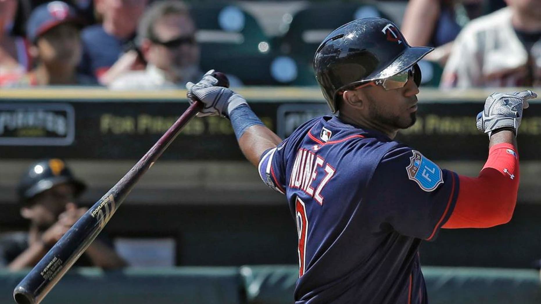 The Minnesota Twins' Eduardo Nunez watches his triple off Pittsburgh Pirates relief pitcher Neftali Feliz during the fourth inning of a spring training baseball game Friday, March 4, 2016, in Bradenton, Fla.