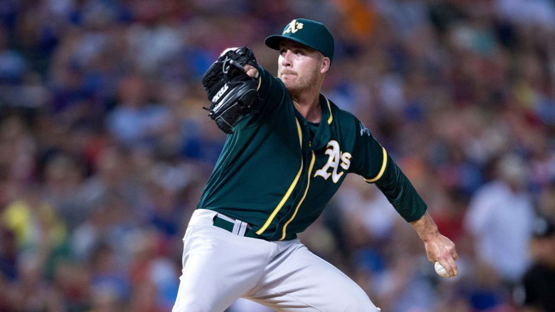 Jul 25, 2014; Arlington, TX, USA; Oakland Athletics relief pitcher Eric O'Flaherty (39) pitches during the game against the Texas Rangers at Globe Life Park in Arlington. The Rangers defeated the Athletics 4-1. Mandatory Credit: Jerome Miron-USA TODAY Sports