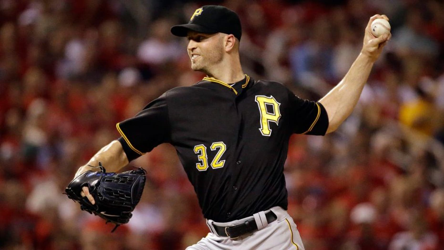 Pittsburgh Pirates starting pitcher J.A. Happ throws during the first inning of a baseball game against the St. Louis Cardinals on Friday, Sept. 4, 2015, in St. Louis. (AP Photo/Jeff Roberson)