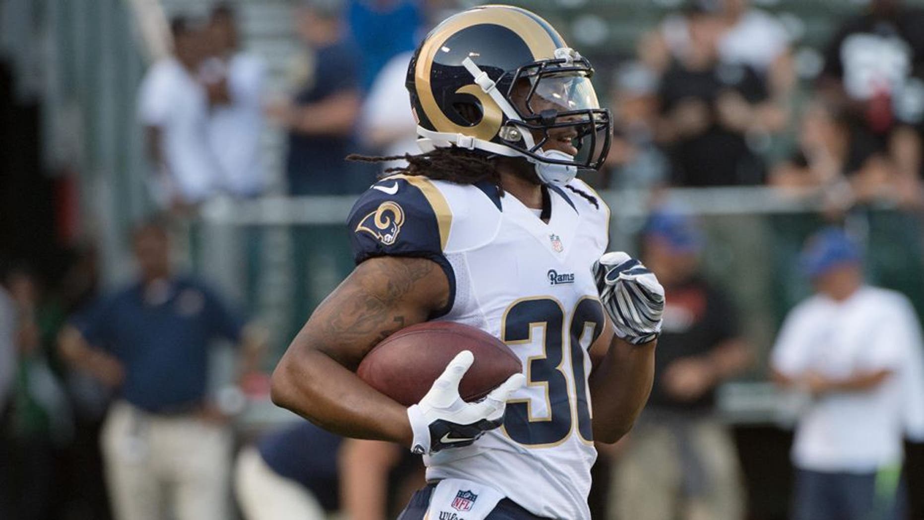 August 14, 2015; Oakland, CA, USA; St. Louis Rams running back Todd Gurley (30) warms up before a preseason NFL football game against the Oakland Raiders at O.co Coliseum. The Raiders defeated the Rams 18-3. Mandatory Credit: Kyle Terada-USA TODAY Sports