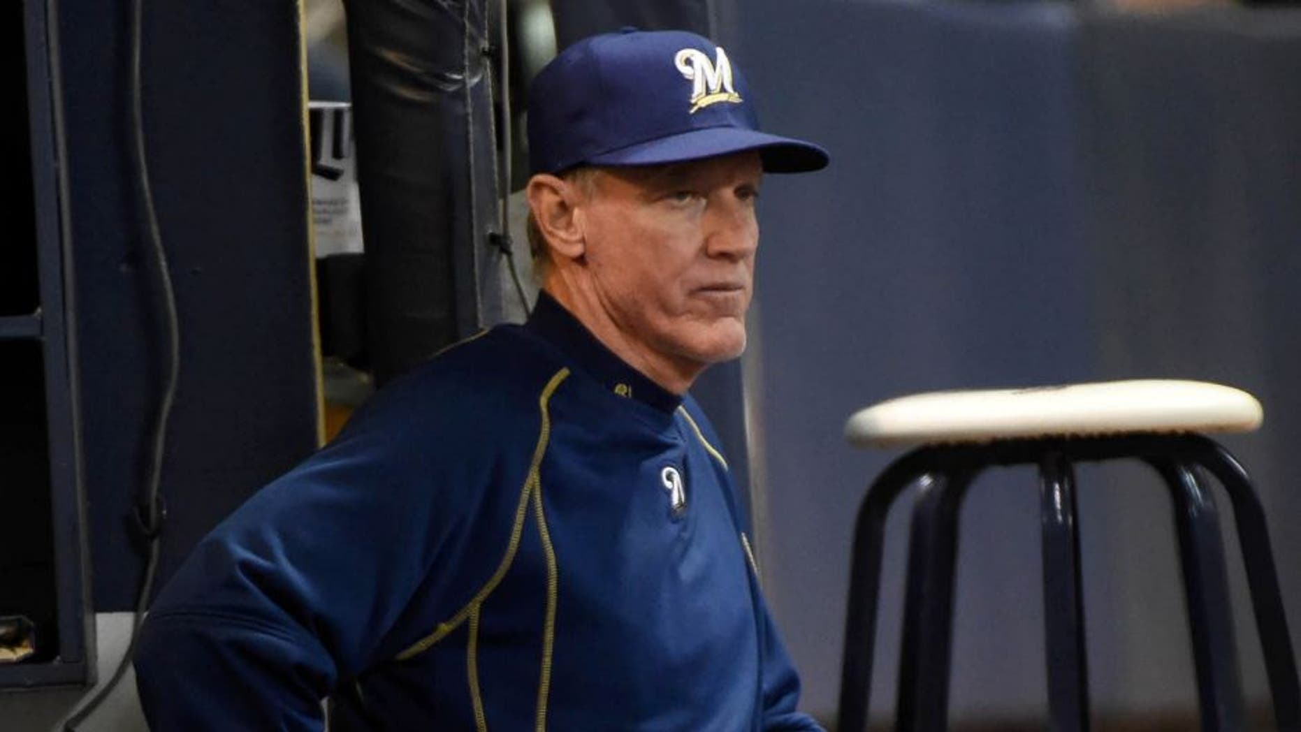 Apr 20, 2015; Milwaukee, WI, USA; Milwaukee Brewers manager Ron Roenicke watches the game against the Cincinnati Reds in the sixth inning at Miller Park.