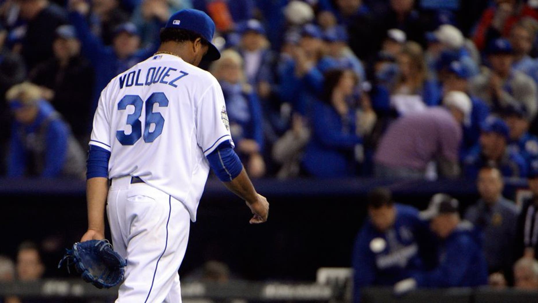 Oct 27, 2015; Kansas City, MO, USA; Kansas City Royals starting pitcher Edinson Volquez (36) walks back to the dugout after retiring the New York Mets in the fourth inning in game one of the 2015 World Series at Kauffman Stadium. Mandatory Credit: John Rieger-USA TODAY Sports