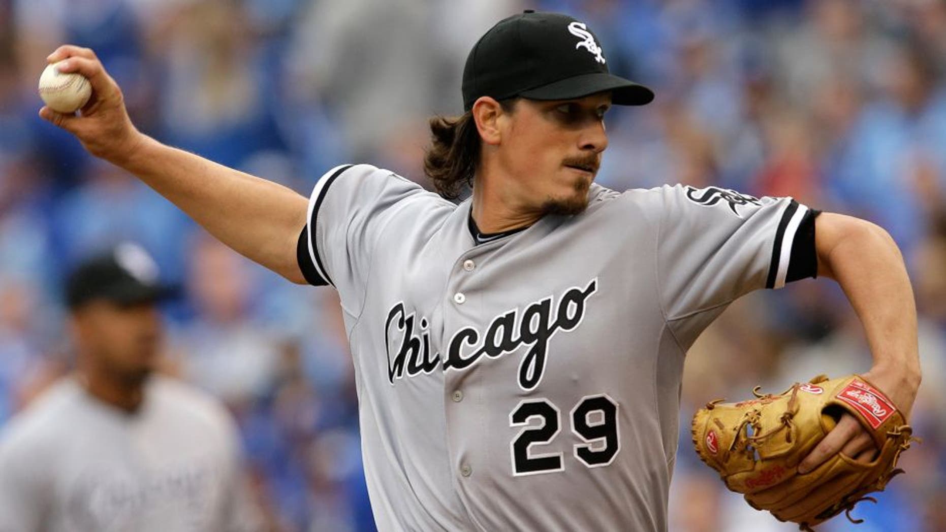 Chicago White Sox starting pitcher Jeff Samardzija (29) delivers to a Kansas City Royals batter during the first inning an opening day baseball game at Kauffman Stadium in Kansas City, Mo., Monday, April 6, 2015. (AP Photo/Orlin Wagner)