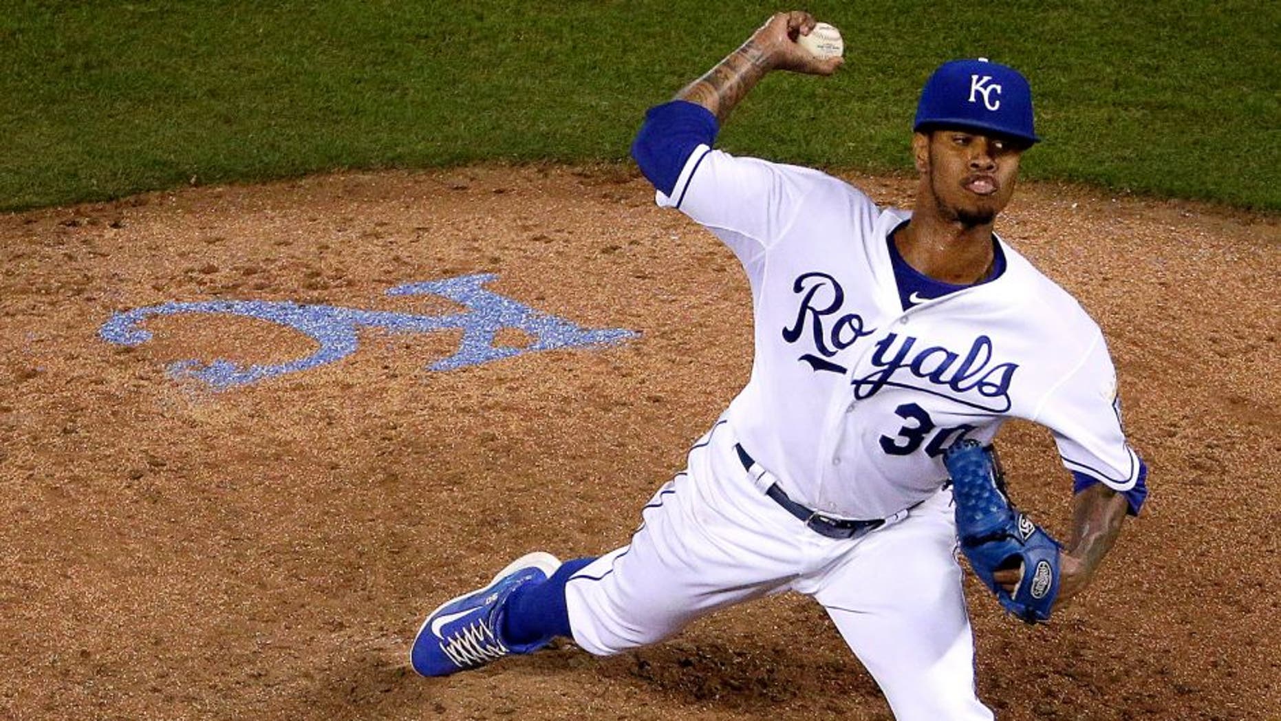 Kansas City Royals starting pitcher Yordano Ventura throws during the sixth inning of a baseball game against the Detroit Tigers on Wednesday, Sept. 2, 2015, in Kansas City, Mo. (AP Photo/Charlie Riedel)