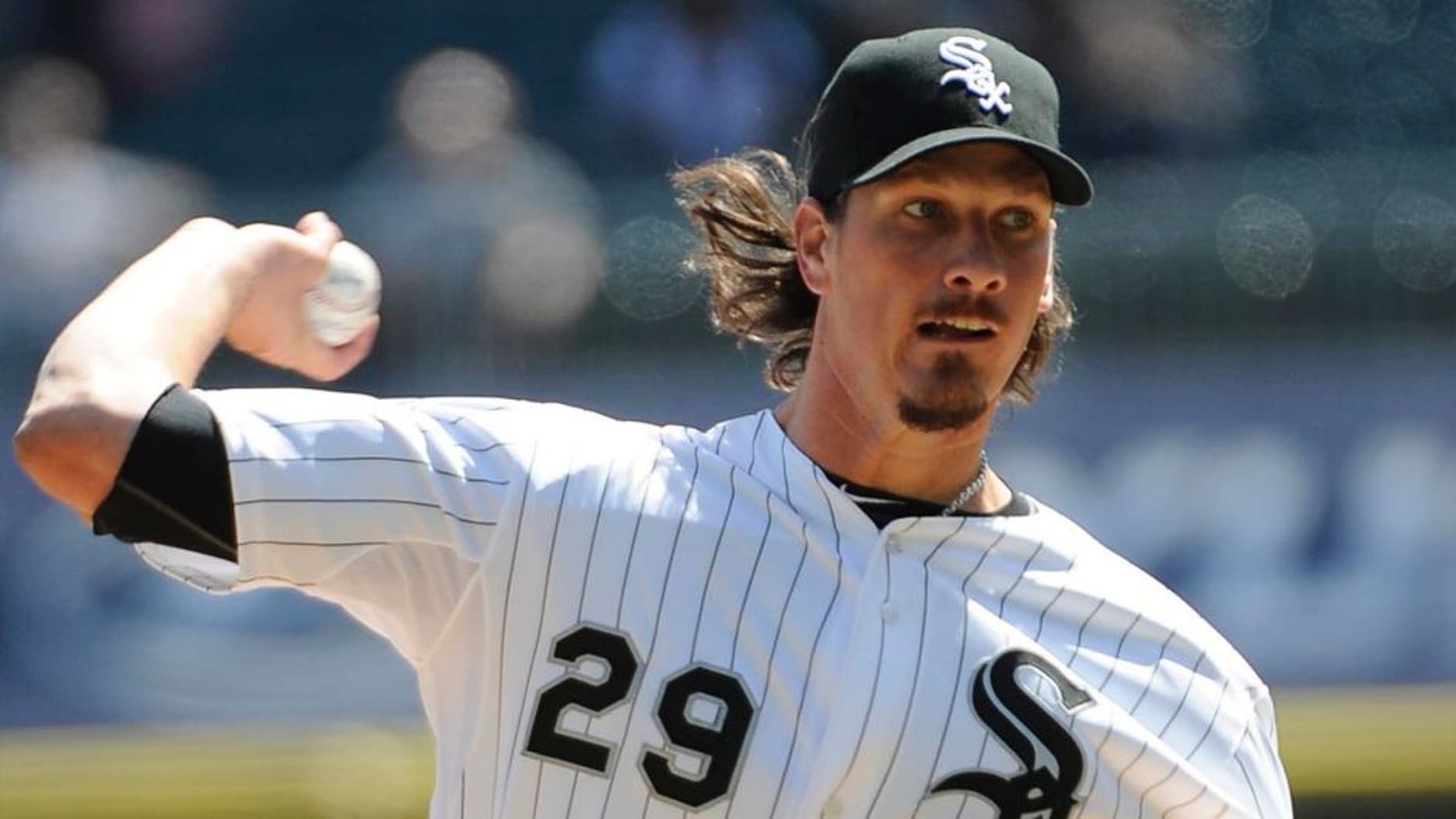 Chicago White Sox starting pitcher Jeff Samardzija throws against the Minnesota Twins during the first inning of a baseball game, Saturday, April 11, 2015 in Chicago.