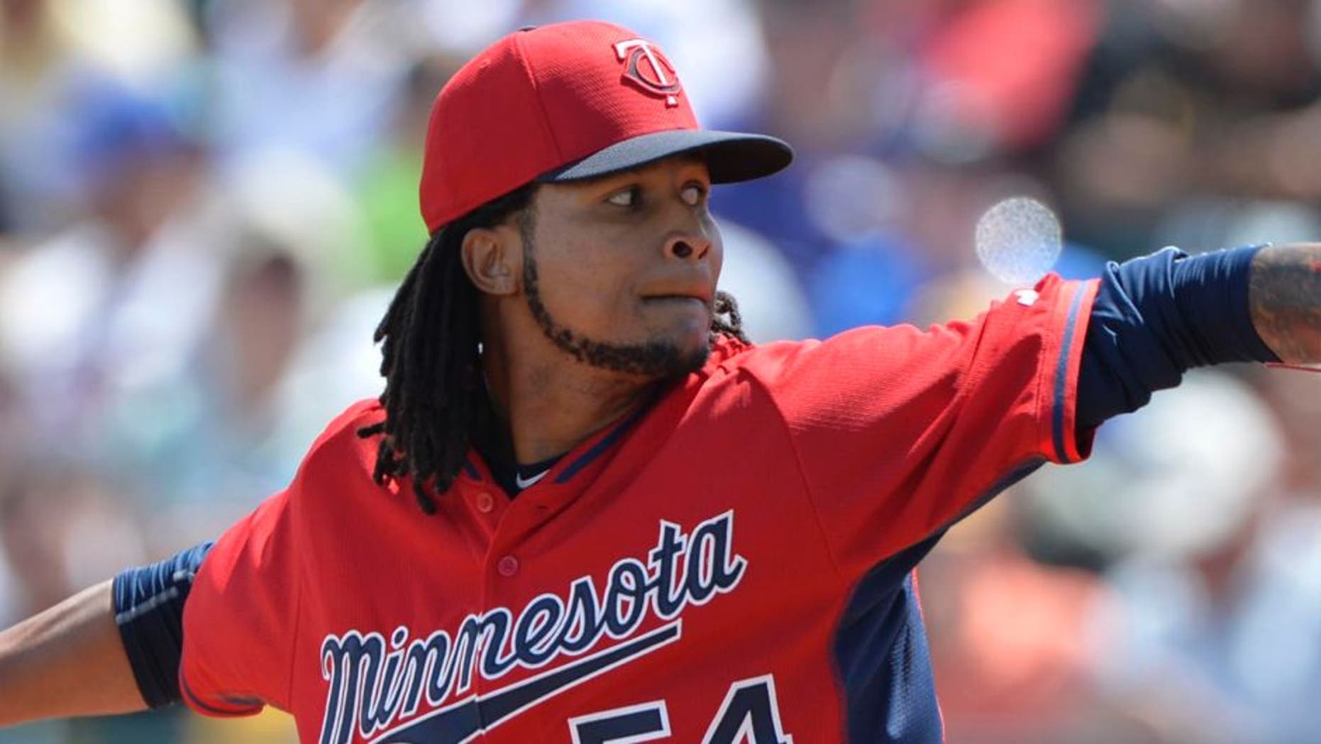 Mar 13, 2015; Bradenton, FL, USA; Minnesota Twins starting pitcher Ervin Santana (54) pitches during the second inning against the Pittsburgh Pirates at McKechnie Field.