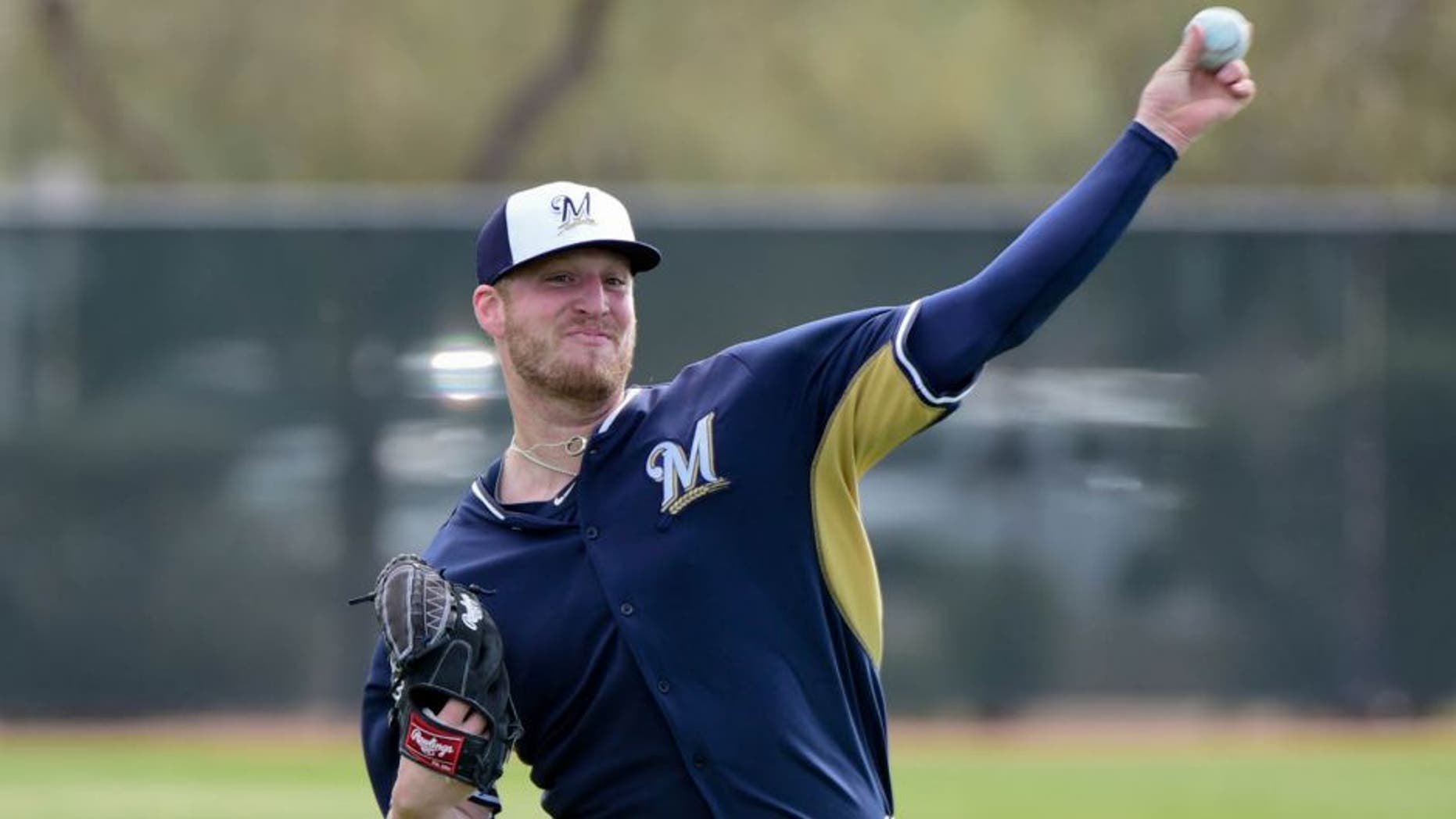 Feb 22, 2015; Phoenix, AZ, USA; Milwaukee Brewers relief pitcher Will Smith throws during a workout at Maryvale Baseball Park.
