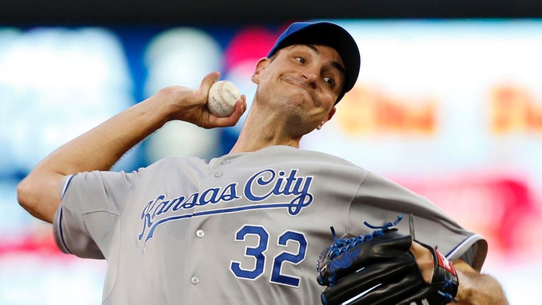Kansas City Royals pitcher Chris Young throws against the Minnesota Twins during the first inning Tuesday, June 9, 2015, in Minneapolis.