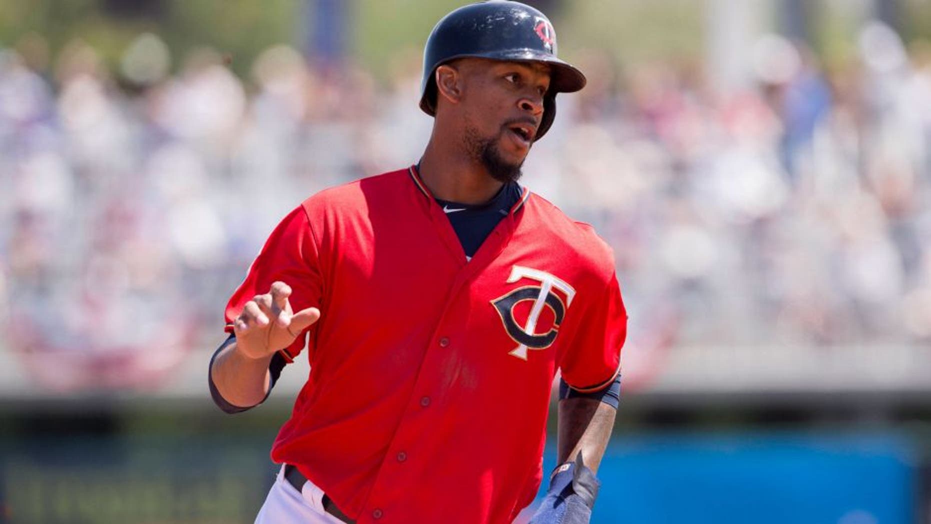 Minnesota Twins designated hitter Byron Buxton runs to third base.