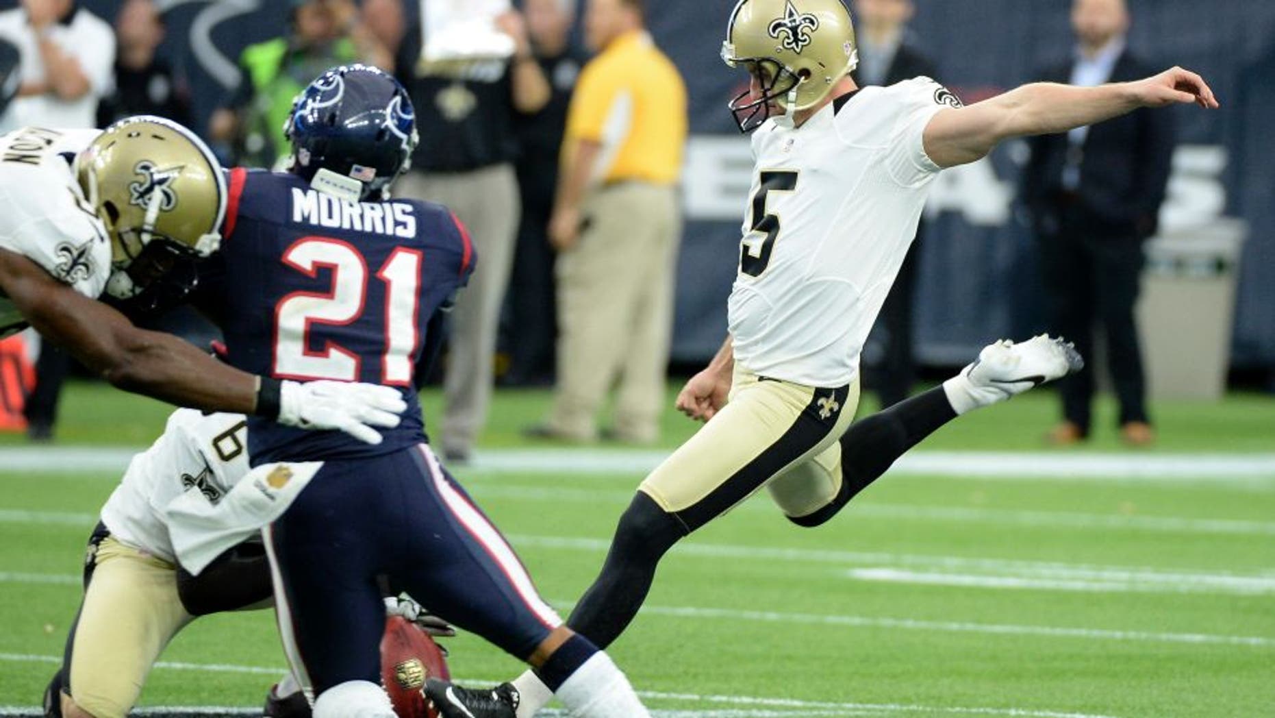 FILE - In this Nov. 29, 2015, file photo, then-New Orleans Saints kicker Kai Forbath (5) kicks a 57-yard field goal during the second quarter of an NFL football game against the Houston Texans, in Houston. Another loss has triggered another round of changes for Minnesota, with new kicker Kai Forbath leading the list as the Vikings try to stop their freefall by letting the struggling Blair Walsh go.(AP Photo/George Bridges, File)