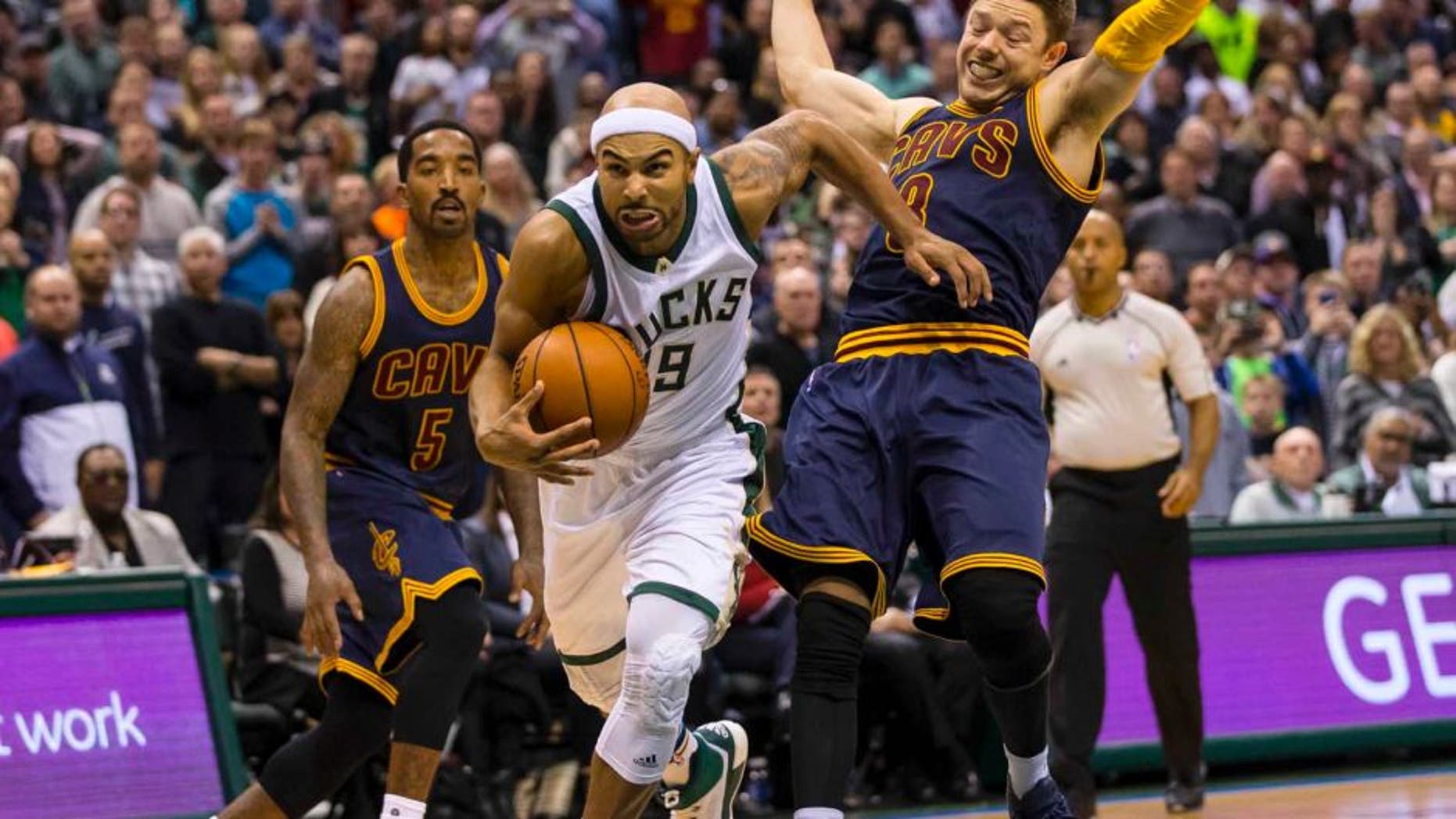 Milwaukee Bucks guard Jerryd Bayless dribbles the ball during the first overtime period against the Cleveland Cavaliers at BMO Harris Bradley Center. The Bucks won 108-105 in double overtime.