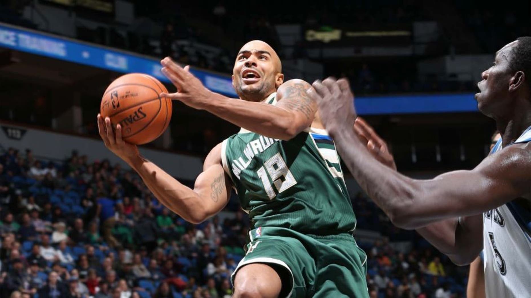 The Milwaukee Bucks' Jerryd Bayless shoots the ball against the Minnesota Timberwolves during a preseason game on Oct. 23, 2015, at Target Center in Minneapolis.