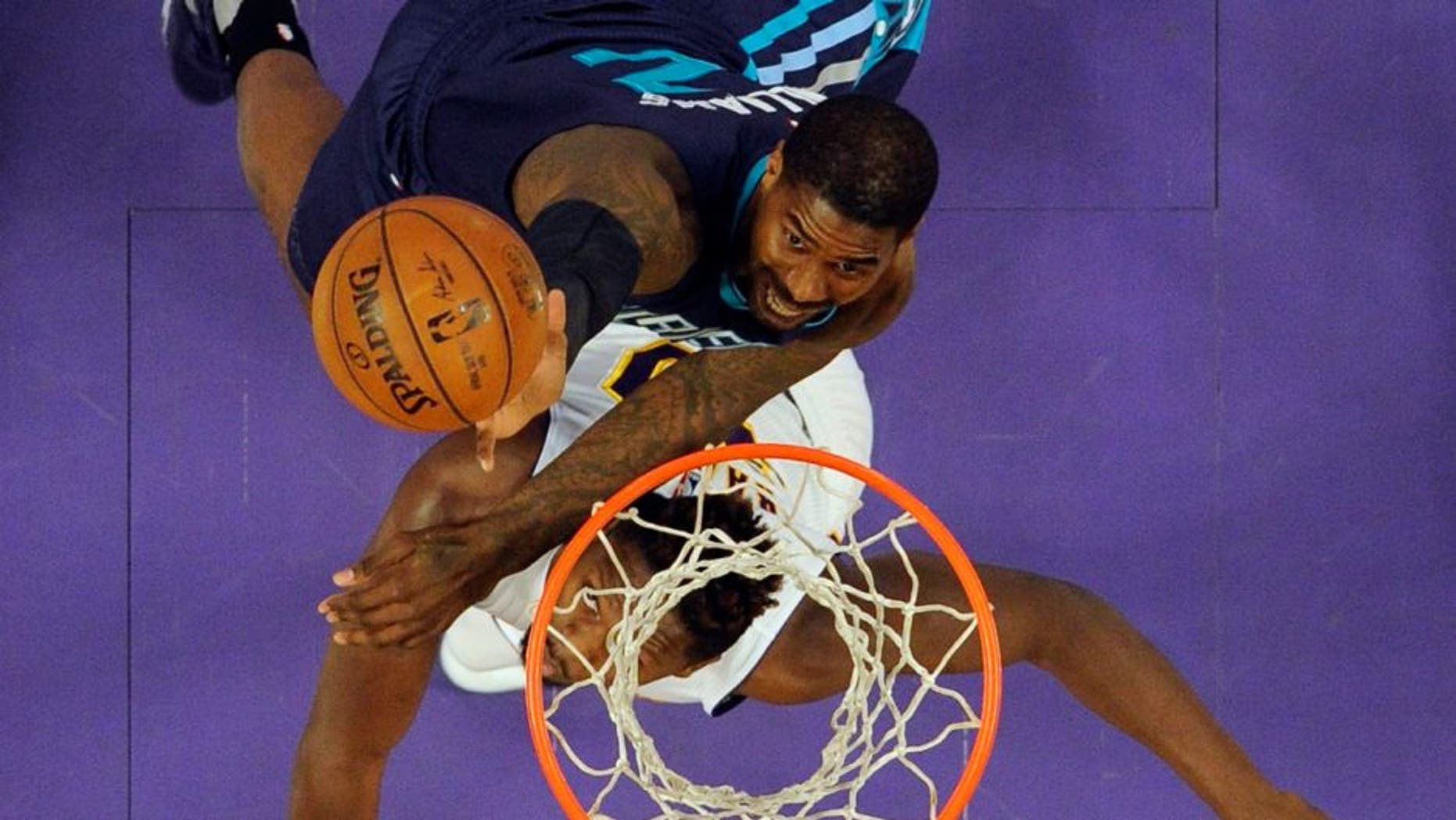 Jan 31, 2016; Los Angeles, CA, USA; Charlotte Hornets forward Marvin Williams (2) shoots the ball against Los Angeles Lakers forward Julius Randle (30) at Staples Center. Mandatory Credit: Richard Mackson-USA TODAY Sports