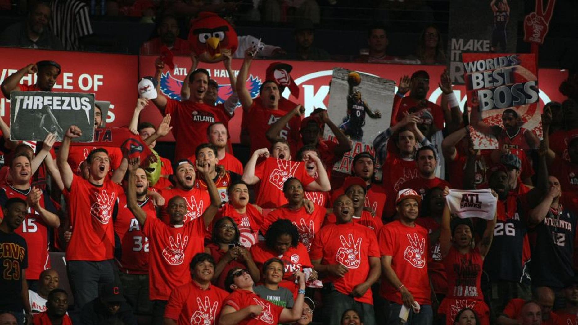 May 22, 2015; Atlanta, GA, USA; Atlanta Hawks fans cheer during the second quarter in game two of the Eastern Conference Finals of the NBA Playoffs against the Cleveland Cavaliers at Philips Arena. Mandatory Credit: Brett Davis-USA TODAY Sports