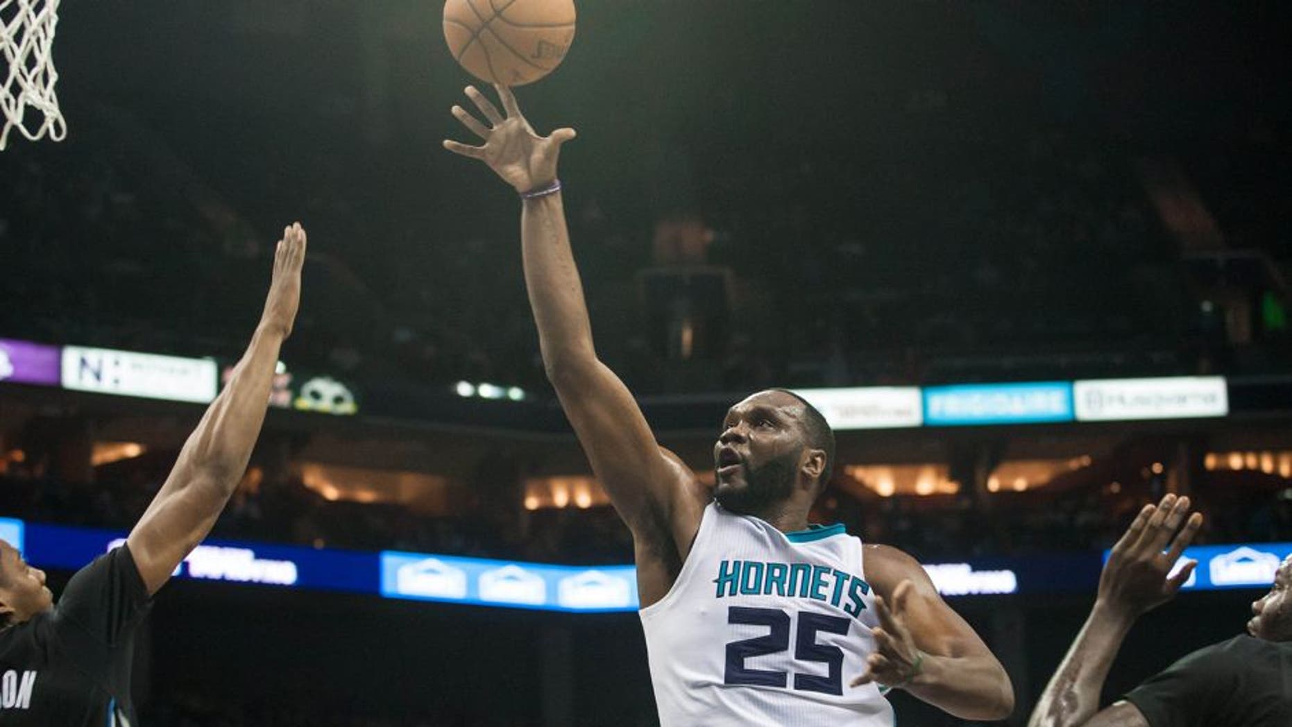 Jan 19, 2015; Charlotte, NC, USA; Charlotte Hornets center Al Jefferson (25) shoots the ball during the second half against the Minnesota Timberwolves at Time Warner Cable Arena. The Hornets won 105-80. Mandatory Credit: Jeremy Brevard-USA TODAY Sports