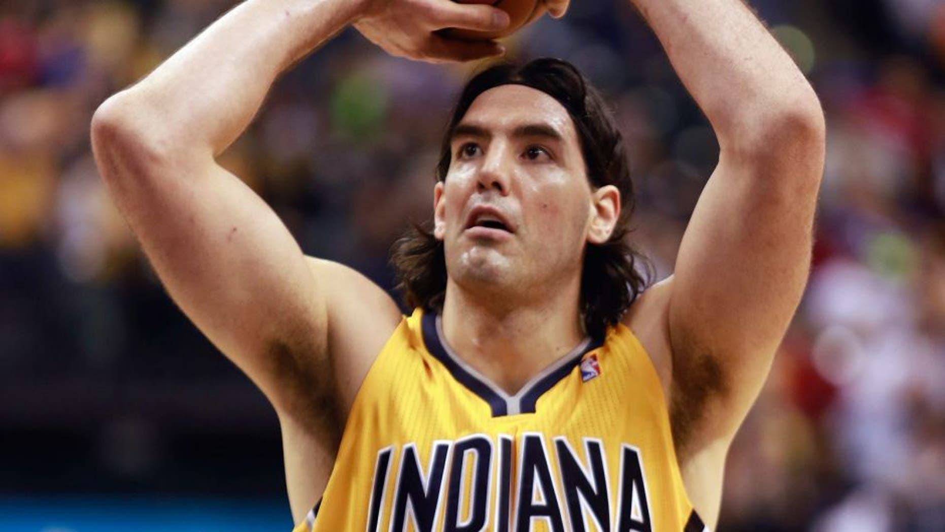 Indiana Pacers forward Luis Scola shoots a free throw against the Chicago Bulls in the second half of an NBA basketball game in Indianapolis, Friday, March 21, 2014. Indiana won 91-79. (AP Photo/R Brent Smith)
