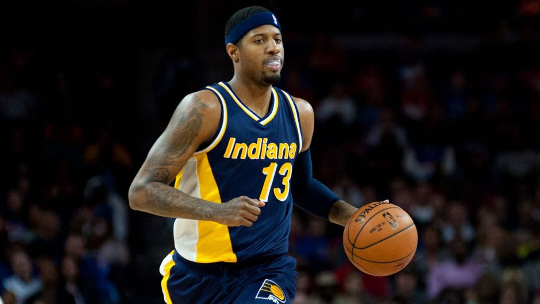 Apr 10, 2015; Auburn Hills, MI, USA; Indiana Pacers forward Paul George (13) brings the ball up court during the fourth quarter against the Detroit Pistons at The Palace of Auburn Hills. Pacers won 107-103. Mandatory Credit: Tim Fuller-USA TODAY Sports