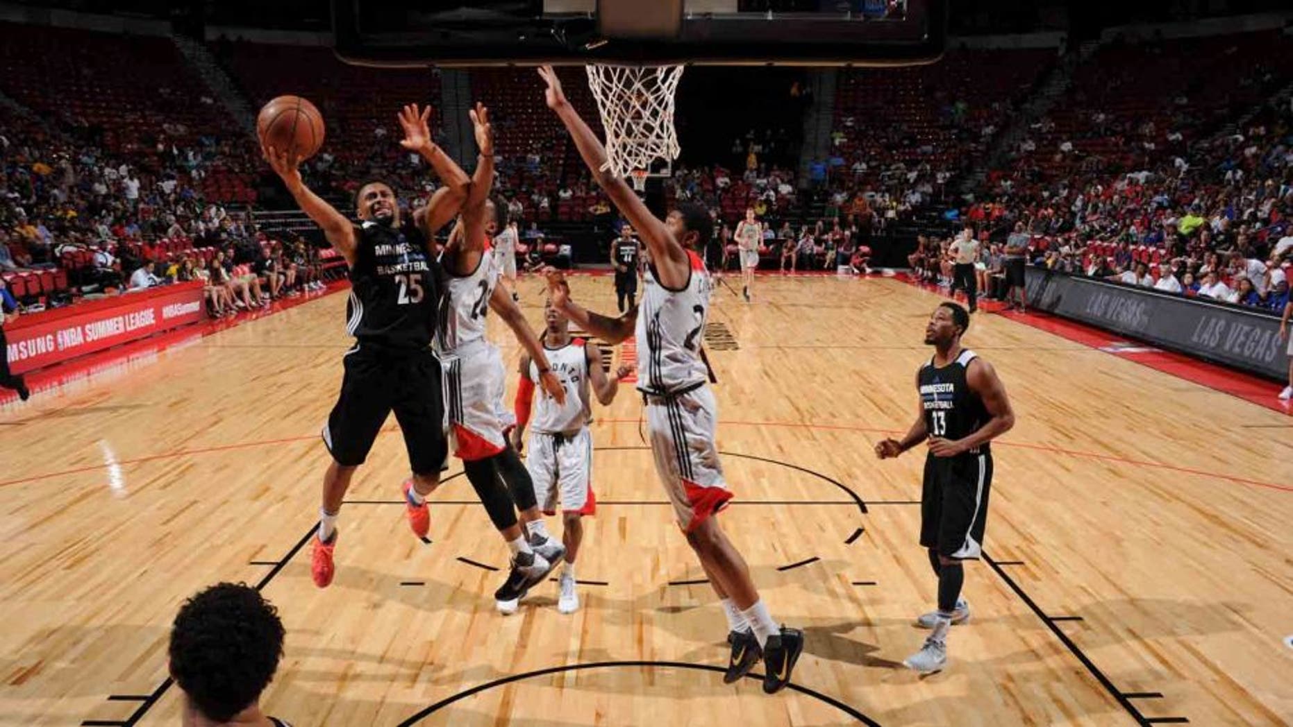 The Minnesota Timberwolves' Xavier Silas shoots the ball against the Toronto Raptors during the 2016 Las Vegas Summer League on July 16, 2016, at the Thomas & Mack Center in Las Vegas.