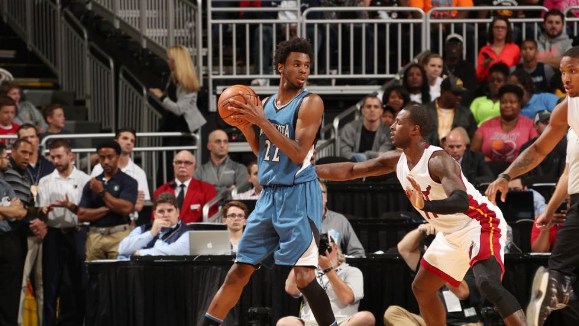 Andrew Wiggins of the Minnesota Timberwolves handles the ball against the Miami Heat.