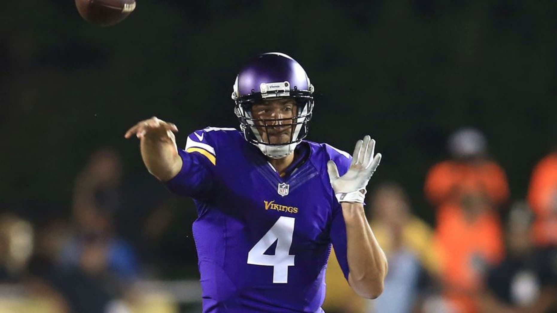 Minnesota Vikings quarterback Mike Kafka throws a pass during the second quarter against the Pittsburgh Steelers at Tom Benson Hall of Fame Stadium in Canton, Ohio, on Sunday, August 9, 2015.