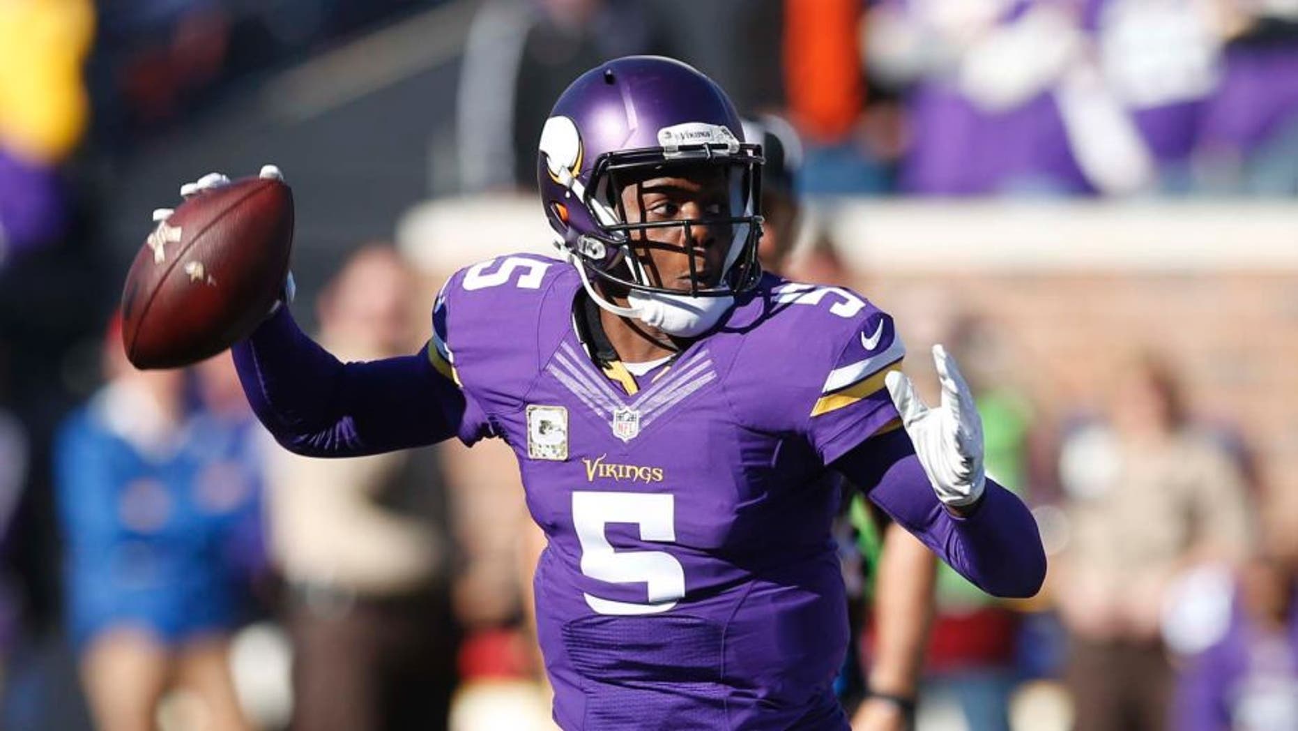 Minnesota Vikings quarterback Teddy Bridgewater prepares to throw during the first half of an NFL football game against the St. Louis Rams on Sunday, Nov. 8, 2015, in Minneapolis.
