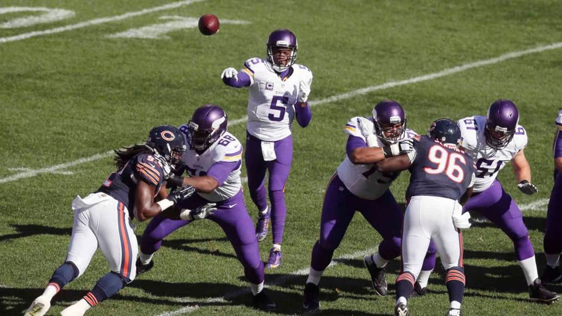 Minnesota Vikings quarterback Teddy Bridgewater throws a pass against the Chicago Bears during the first half of an NFL football game Sunday, Nov. 1, 2015, in Chicago.