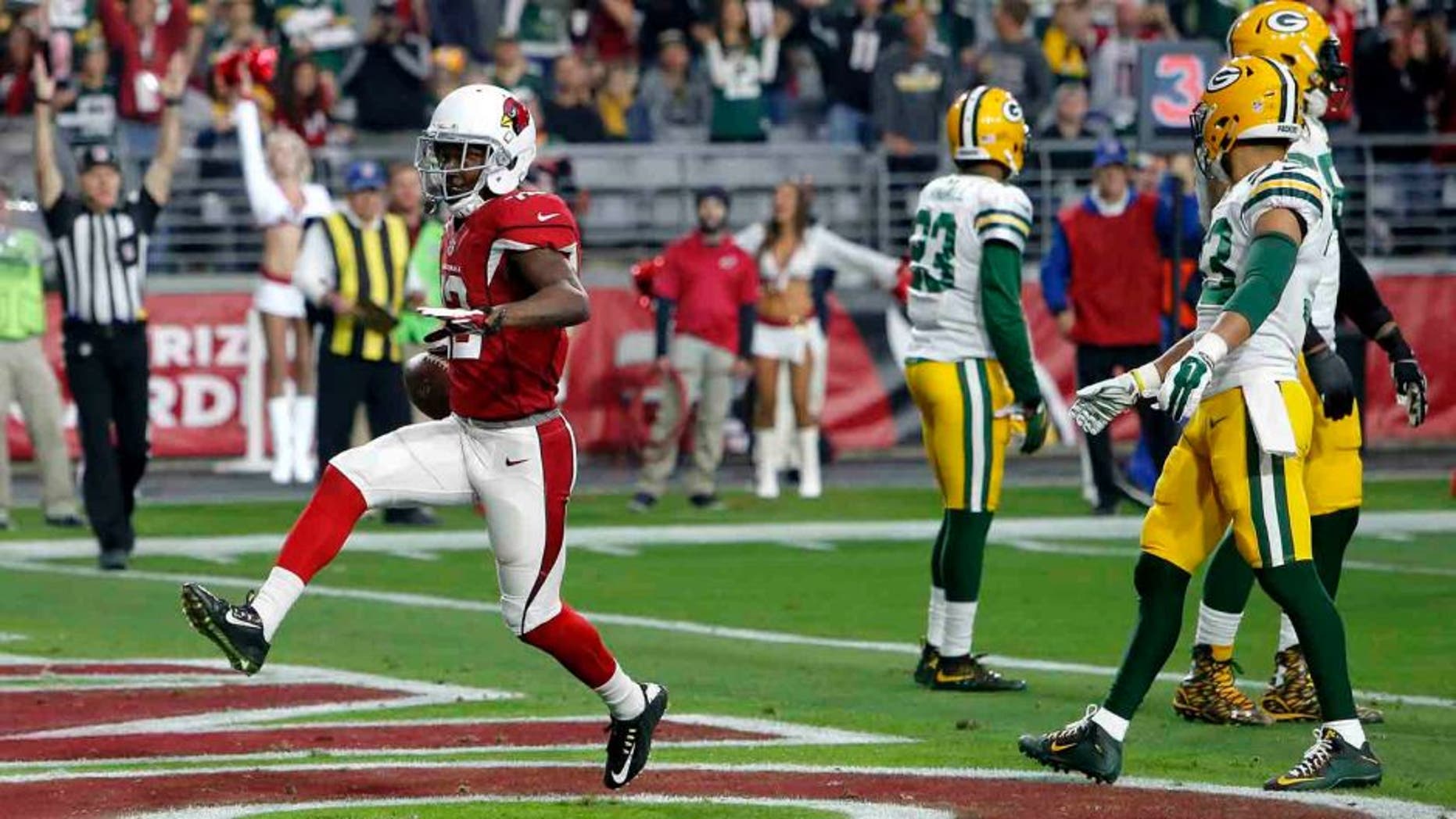 Arizona Cardinals wide receiver John Brown scores a touchdown against the Green Bay Packers during the first half Sunday, Dec. 27, 2015, in Glendale, Ariz.