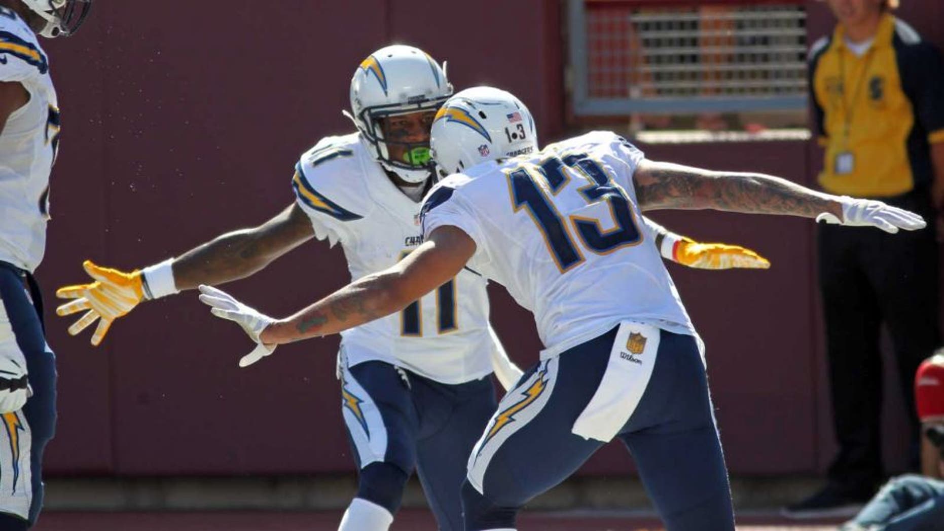 San Diego Chargers wide receiver Keenan Allen (right) celebrates with Steve Johnson after scoring a touchdown against the Minnesota Vikings in the first half in Minneapolis on Sunday, Sept. 27, 2015.