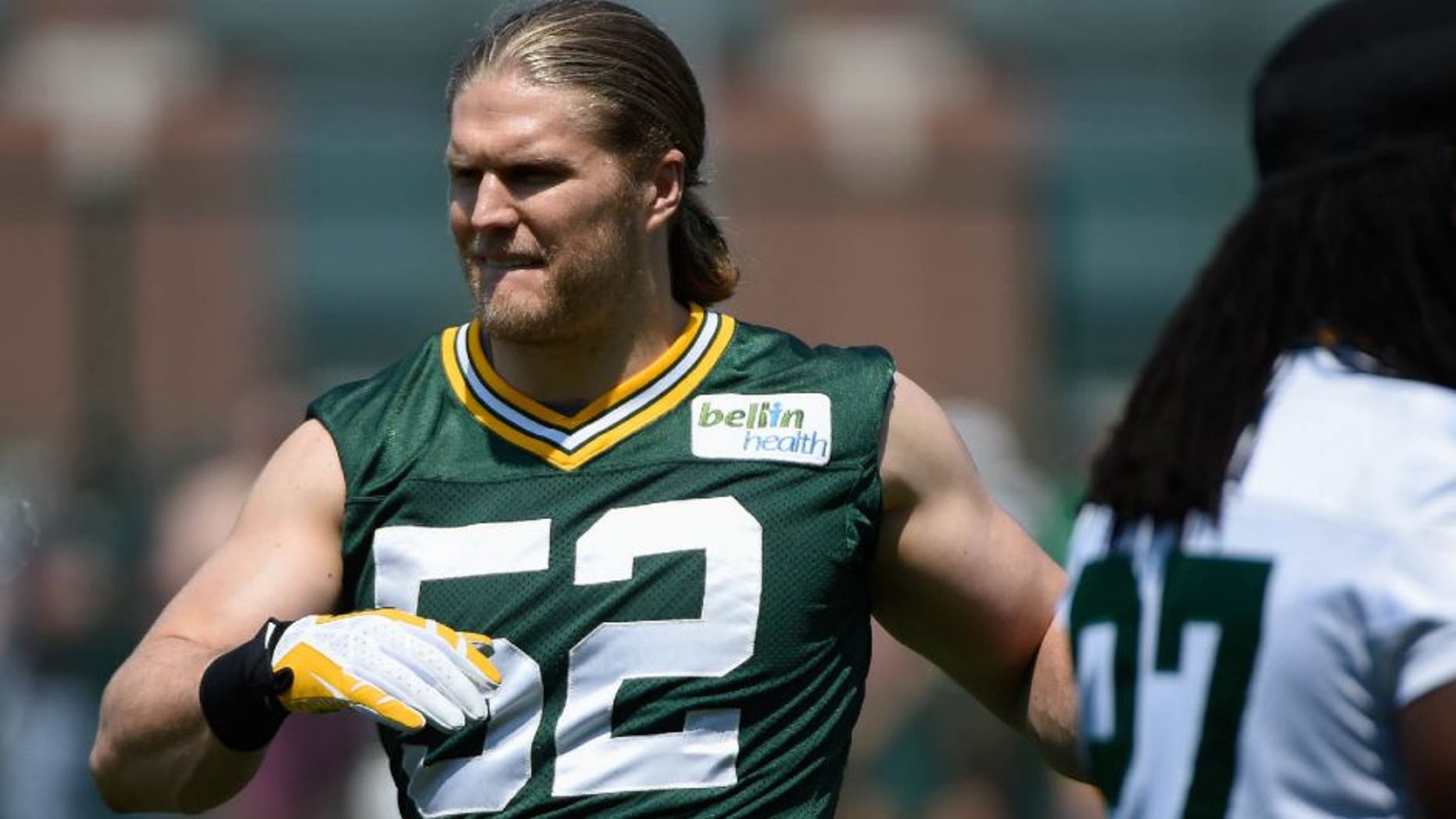 May 28, 2015; Green Bay, WI, USA; Green Bay Packers linebacker Clay Matthews (52) gets ready during Rookie Orientation Camp and Organized Team Activities at the Don Hutson Center in Green Bay. Mandatory Credit: Benny Sieu-USA TODAY Sports