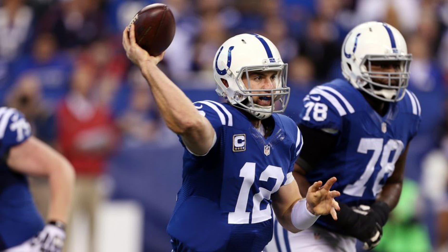 Dec 14, 2014; Indianapolis, IN, USA; Indianapolis Colts quarterback Andrew Luck (12) throws a pass against the Houston Texans at Lucas Oil Stadium. Mandatory Credit: Brian Spurlock-USA TODAY Sports