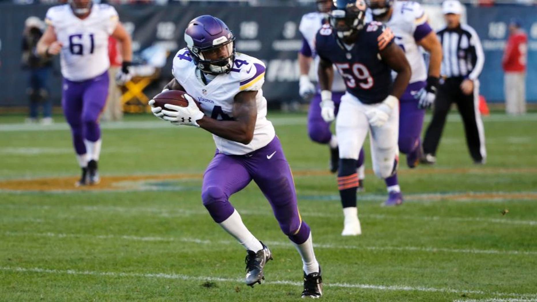 Minnesota Vikings wide receiver Stefon Diggs runs to the end zone for a touchdown during the second half of an NFL football game against the Chicago Bears on Sunday, Nov. 1, 2015, in Chicago.