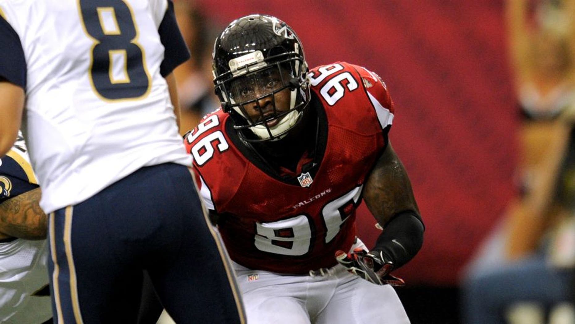 Sep 15, 2013; Atlanta, GA, USA; Atlanta Falcons defensive end Jonathan Massaquoi (96) shown in action against the St. Louis Rams during the game at Georgia Dome. The Falcons defeated the Rams 31-24. Mandatory Credit: Dale Zanine-USA TODAY Sports