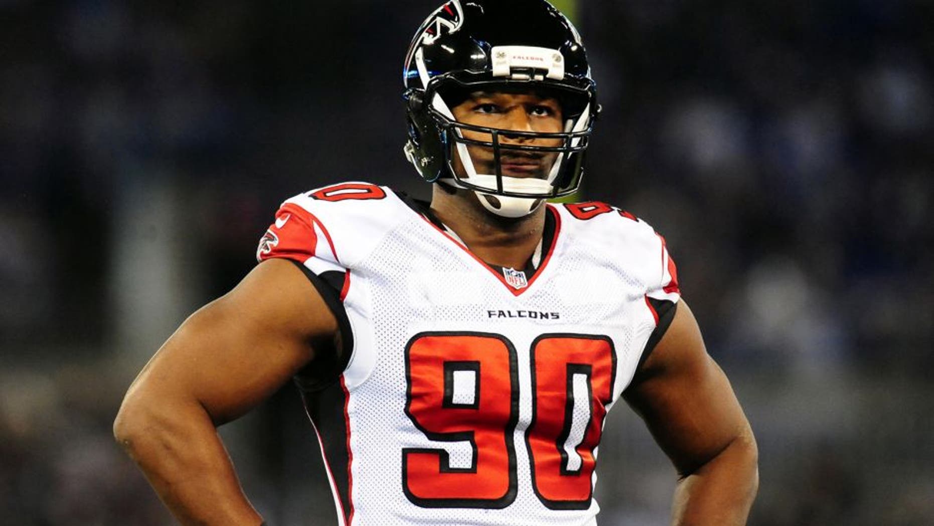 Aug 15, 2013; Baltimore, MD, USA; Atlanta Falcons defensive end Osi Umenyiora (90) looks on during the second quarter against the Baltimore Ravens at M&T Bank Stadium. Mandatory Credit: Evan Habeeb-USA TODAY Sports