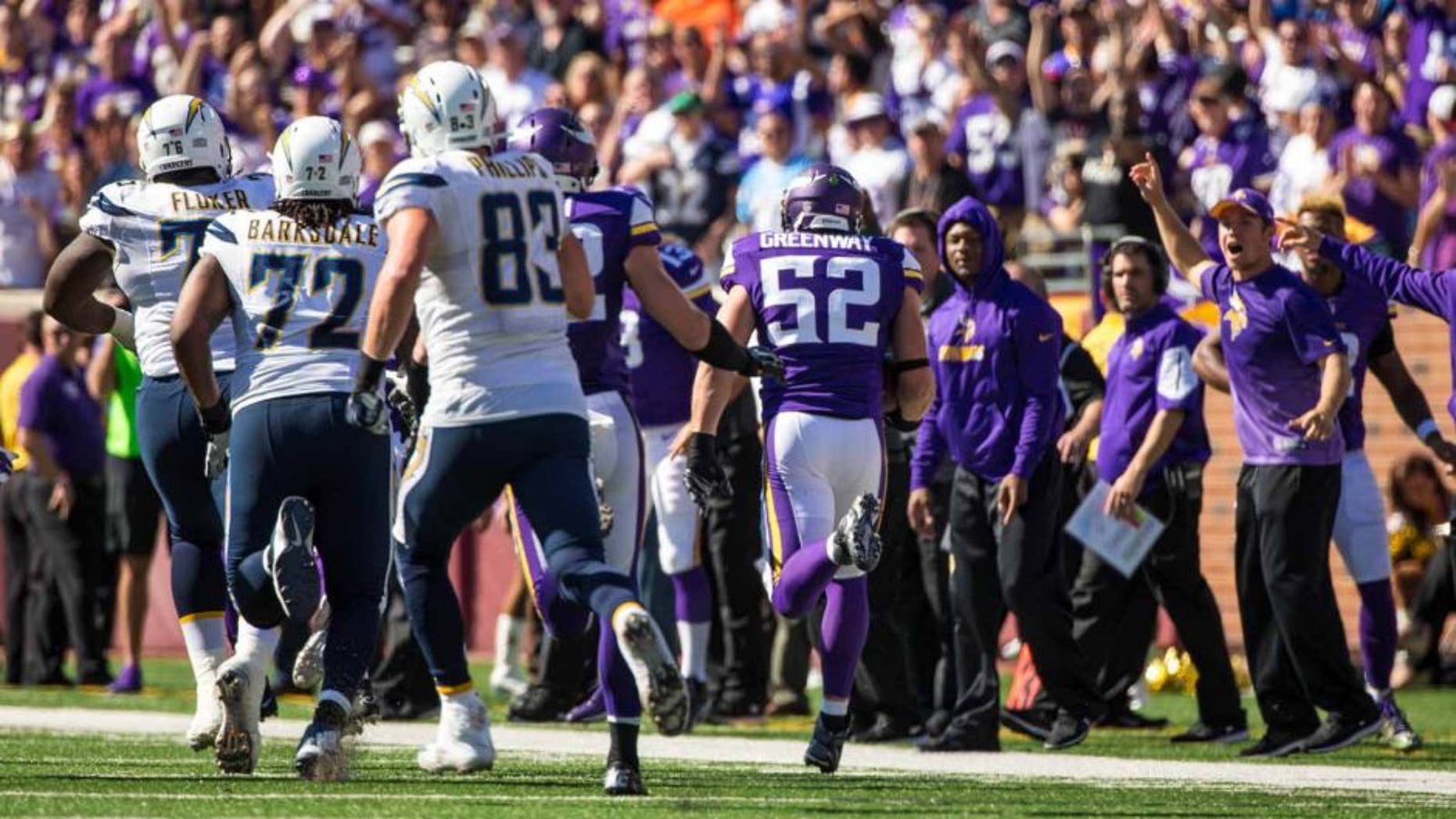 Minnesota Vikings linebacker Chad Greenway returns an interception for a touchdown during the fourth quarter against the San Diego Chargers at TCF Bank Stadium in Minneapolis on Sunday, Sept. 27, 2015. The Vikings defeated the Chargers 31-14.