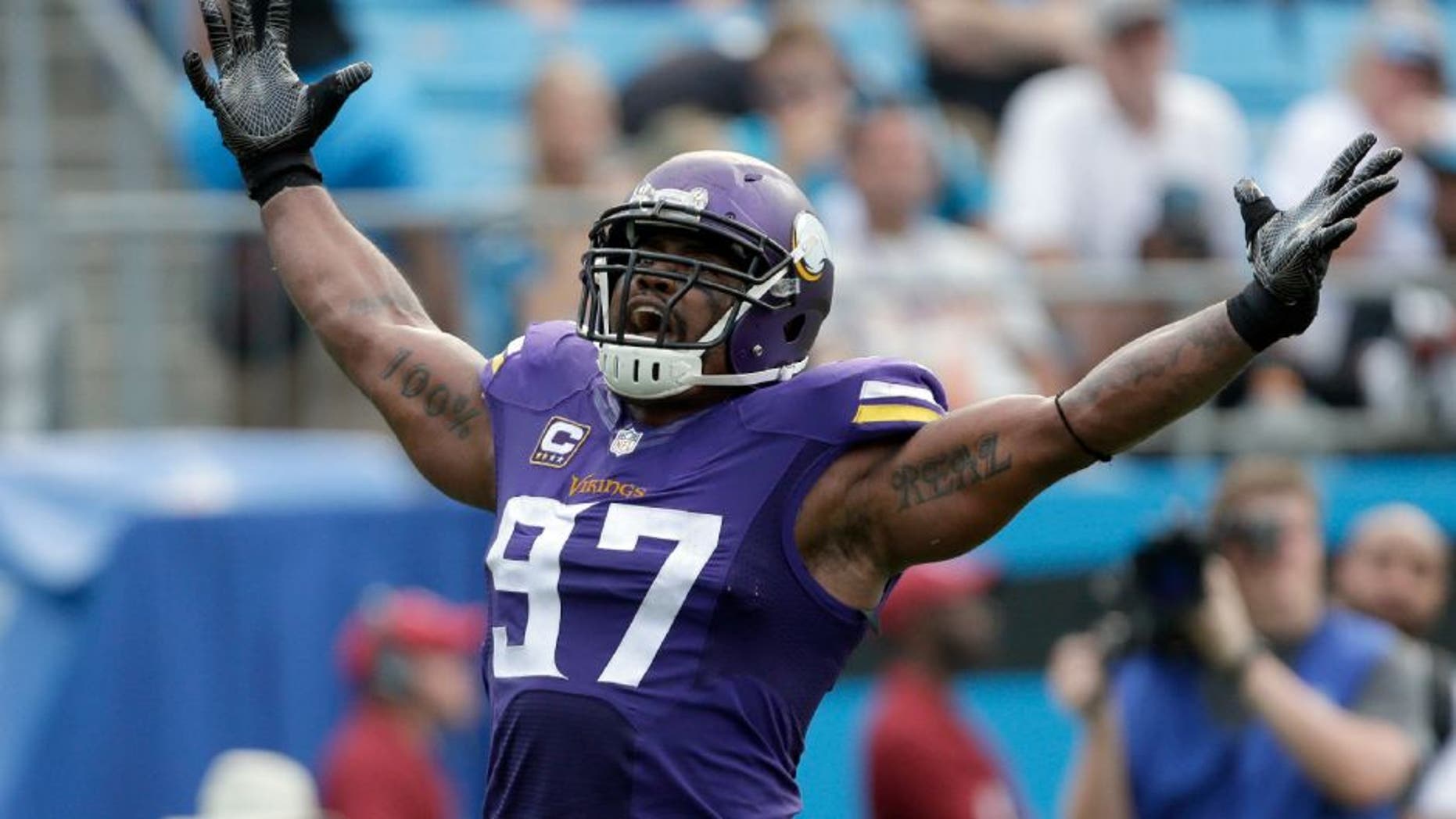 The Minnesota Vikings' Everson Griffen celebrates after a sack against the Carolina Panthers in the second half in Charlotte, N.C.