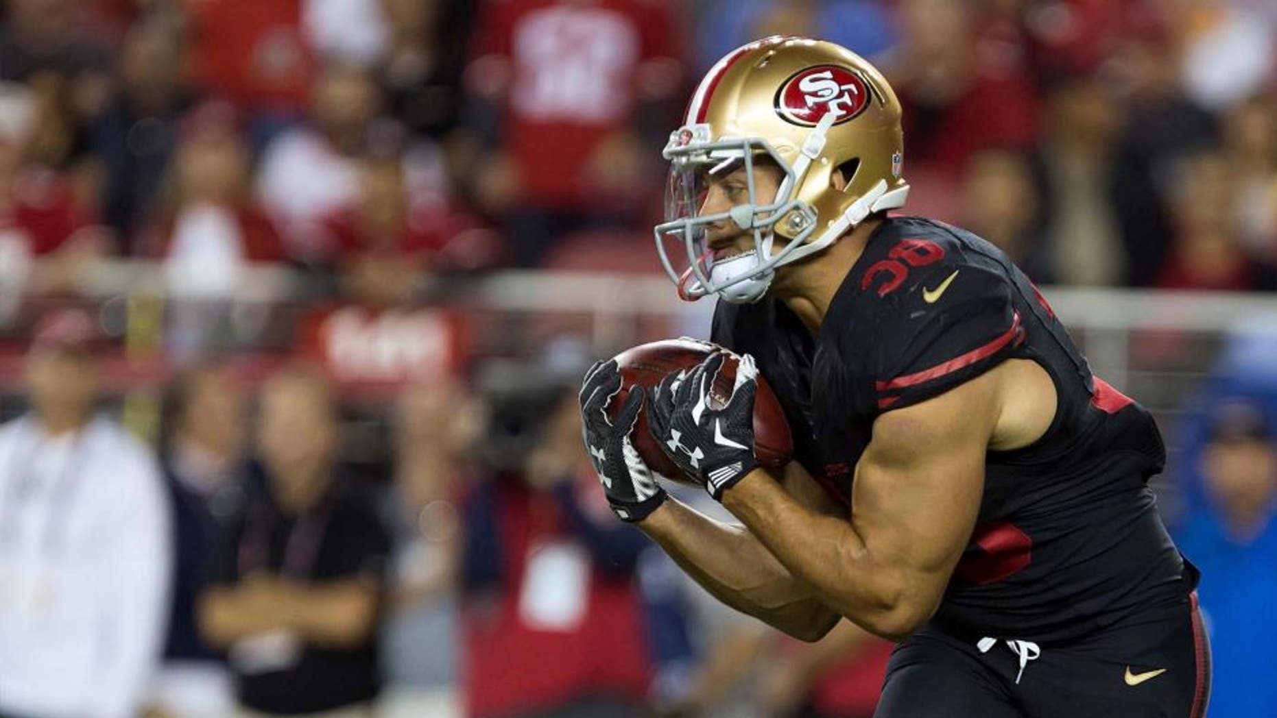 San Francisco 49ers running back Jarryd Hayne catches the ball on a punt return against the Minnesota Vikings during the second quarter at Levi's Stadium in Santa Clara, Calif., on Monday, Sept. 14, 2015.