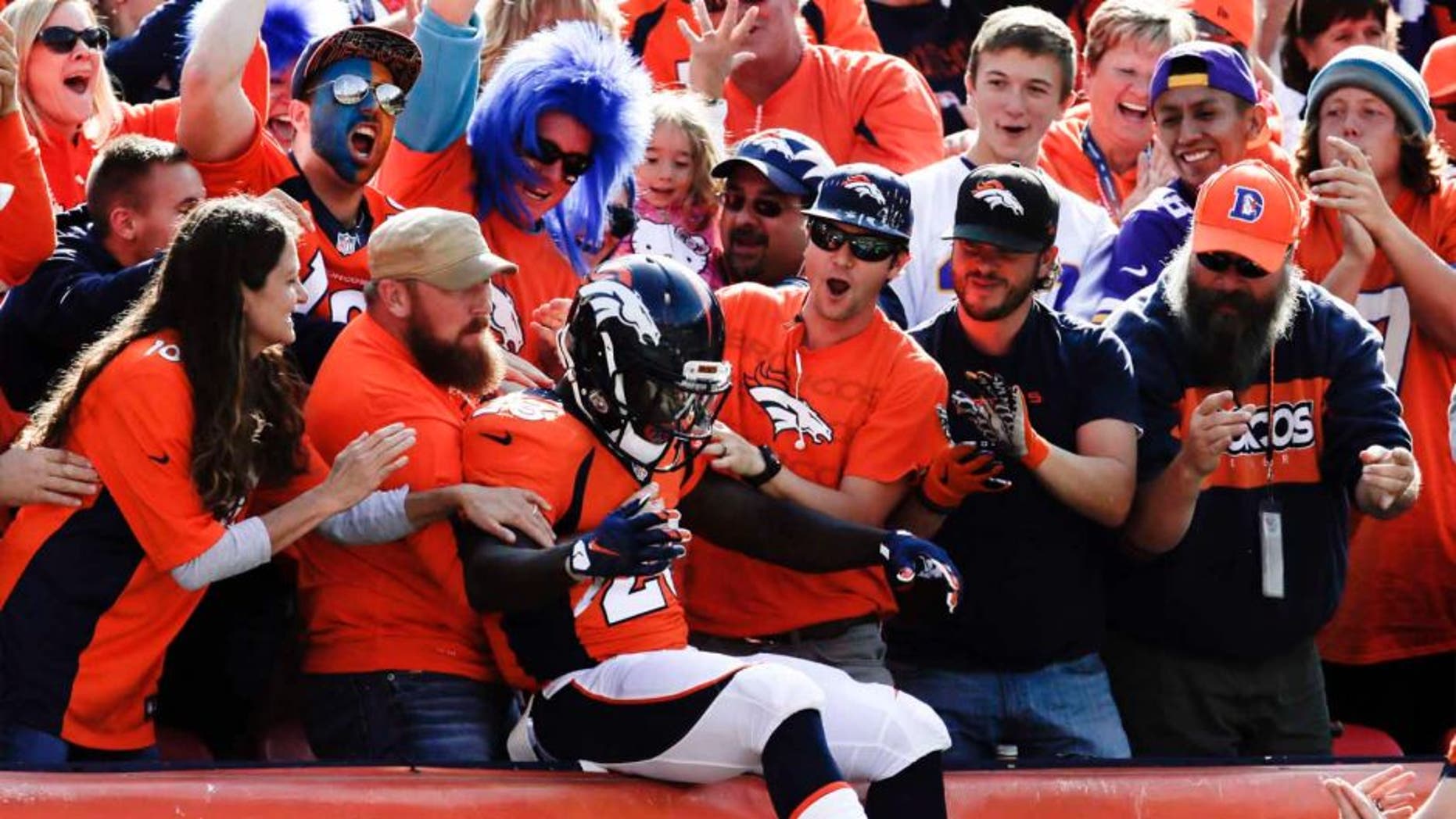 Denver Broncos running back Ronnie Hillman celebrates after scoring against the Minnesota Vikings during the first half Sunday, Oct. 4, 2015, in Denver.