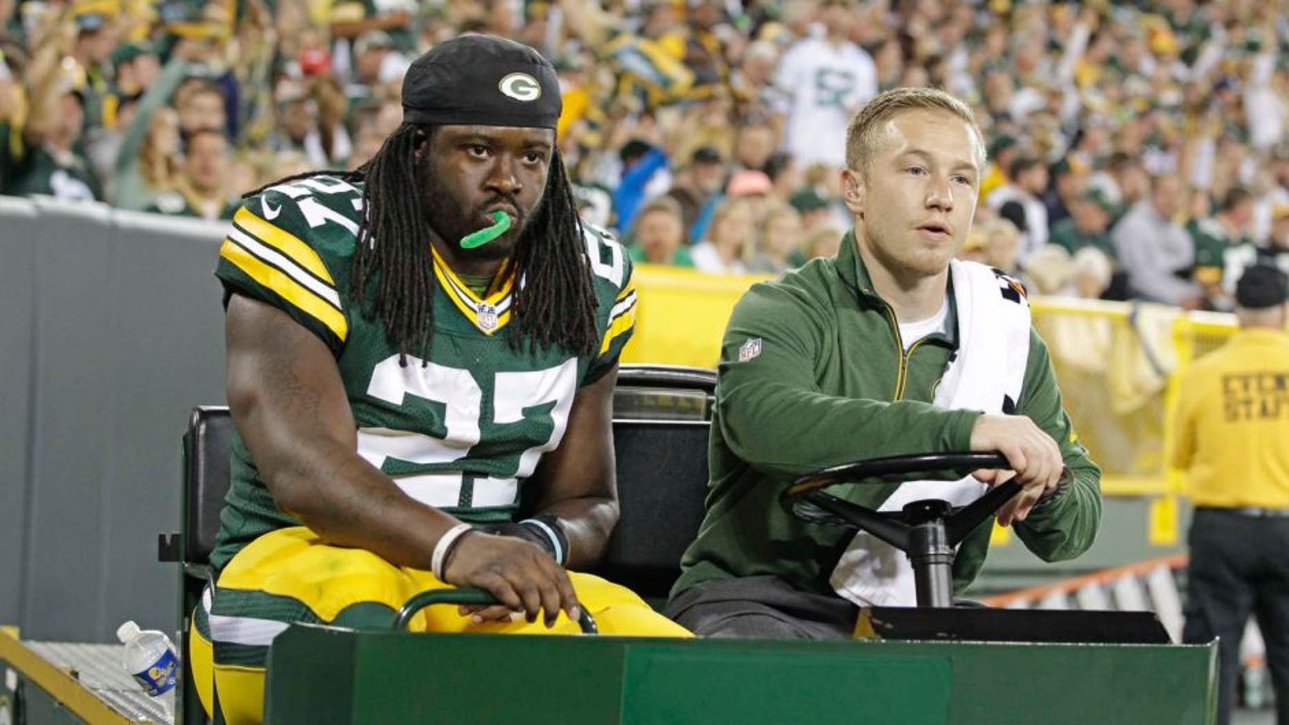 Green Bay Packers running back Eddie Lacy is carted off the field after being injured during an NFL football game against the Seattle Seahawks, Sunday, Sept. 20, 2015 at Lambeau Field in Green Bay, Wis.