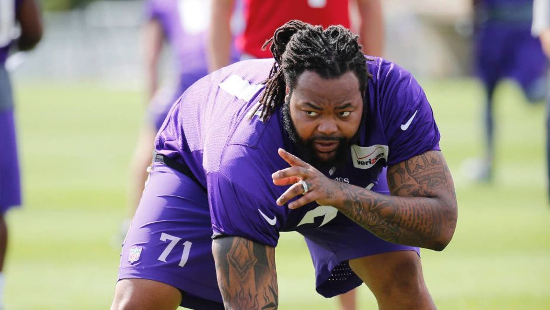 Sunday, July 26: Minnesota Vikings tackle Phil Loadholt identifies a defensive player during practice at training camp on the campus of Minnesota State University in Mankato.